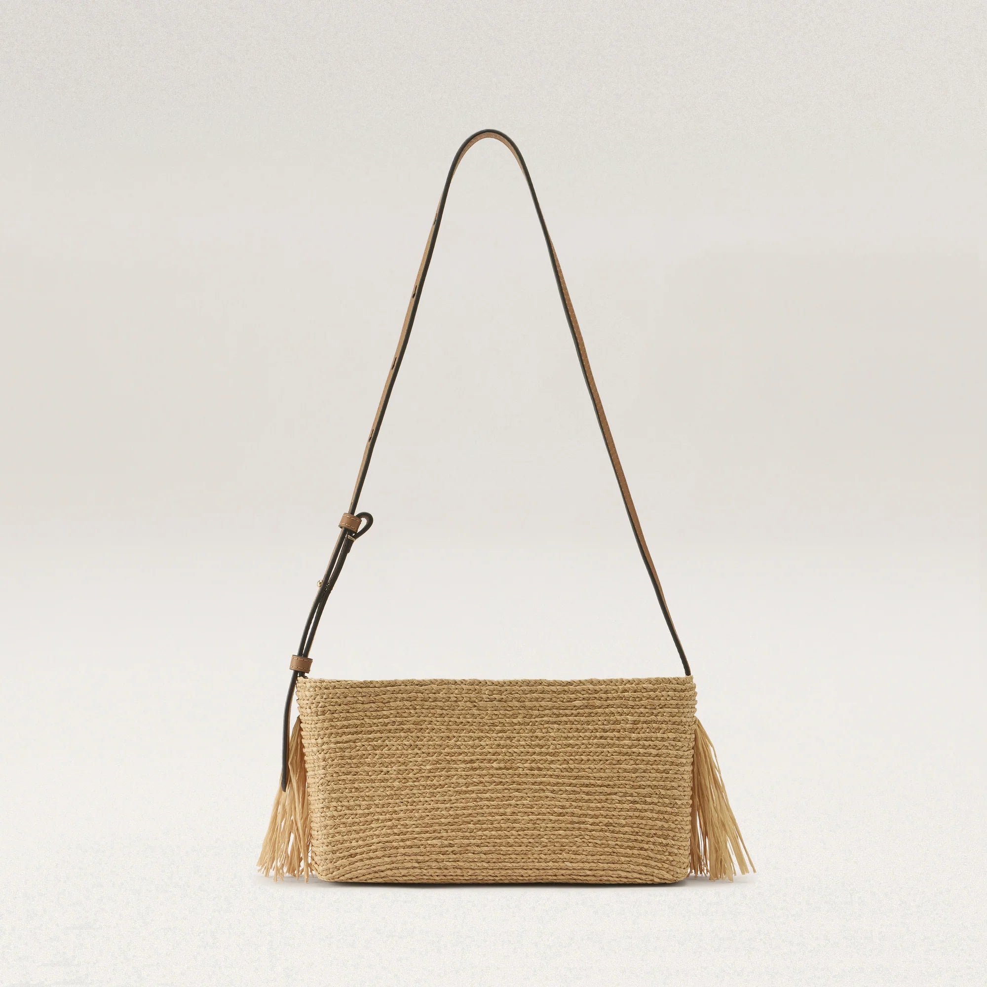 back view of Dawn Raffia Fringe Crossbody by Helen Kaminski