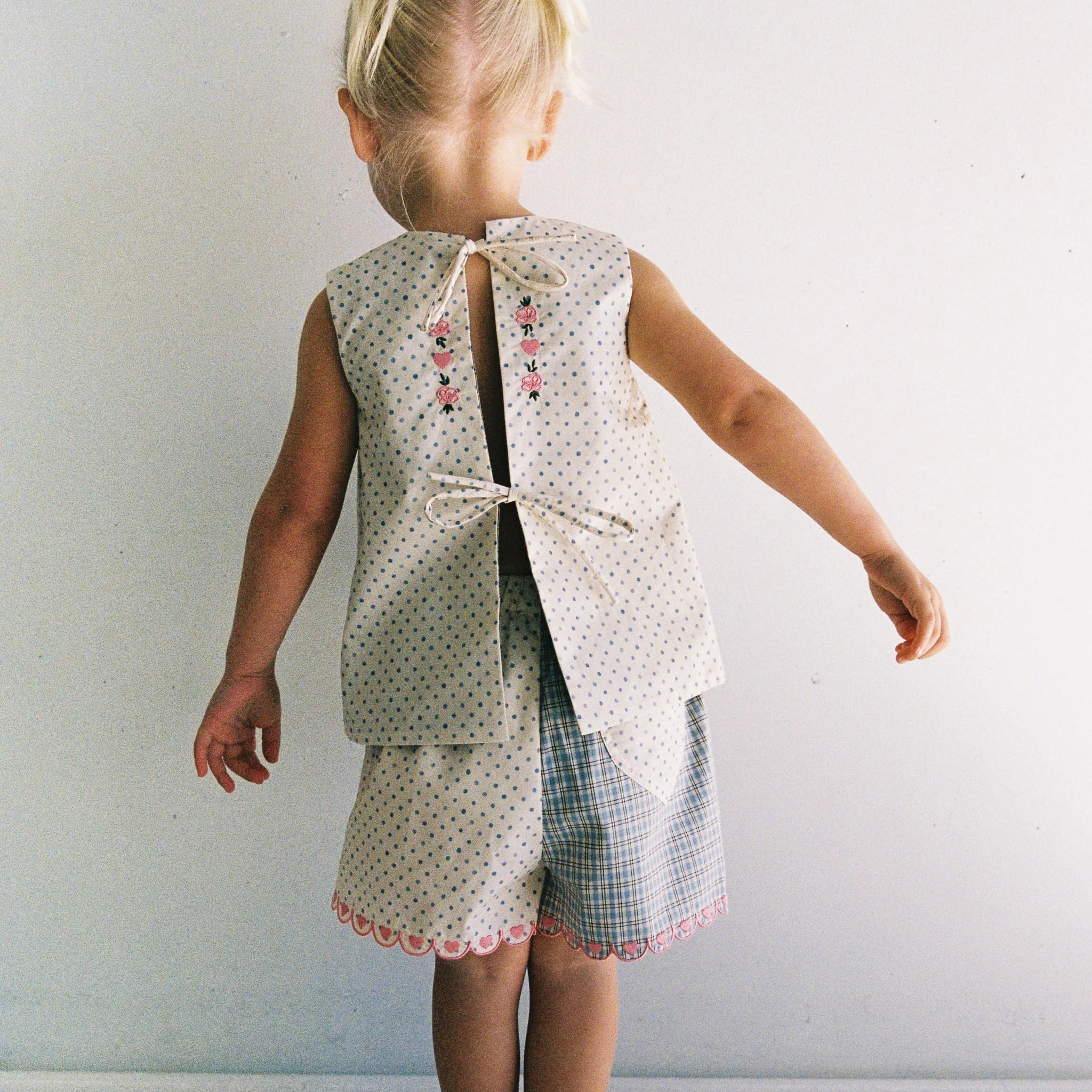 girl wearing Della Short - blue check by JUNI with matching Della top