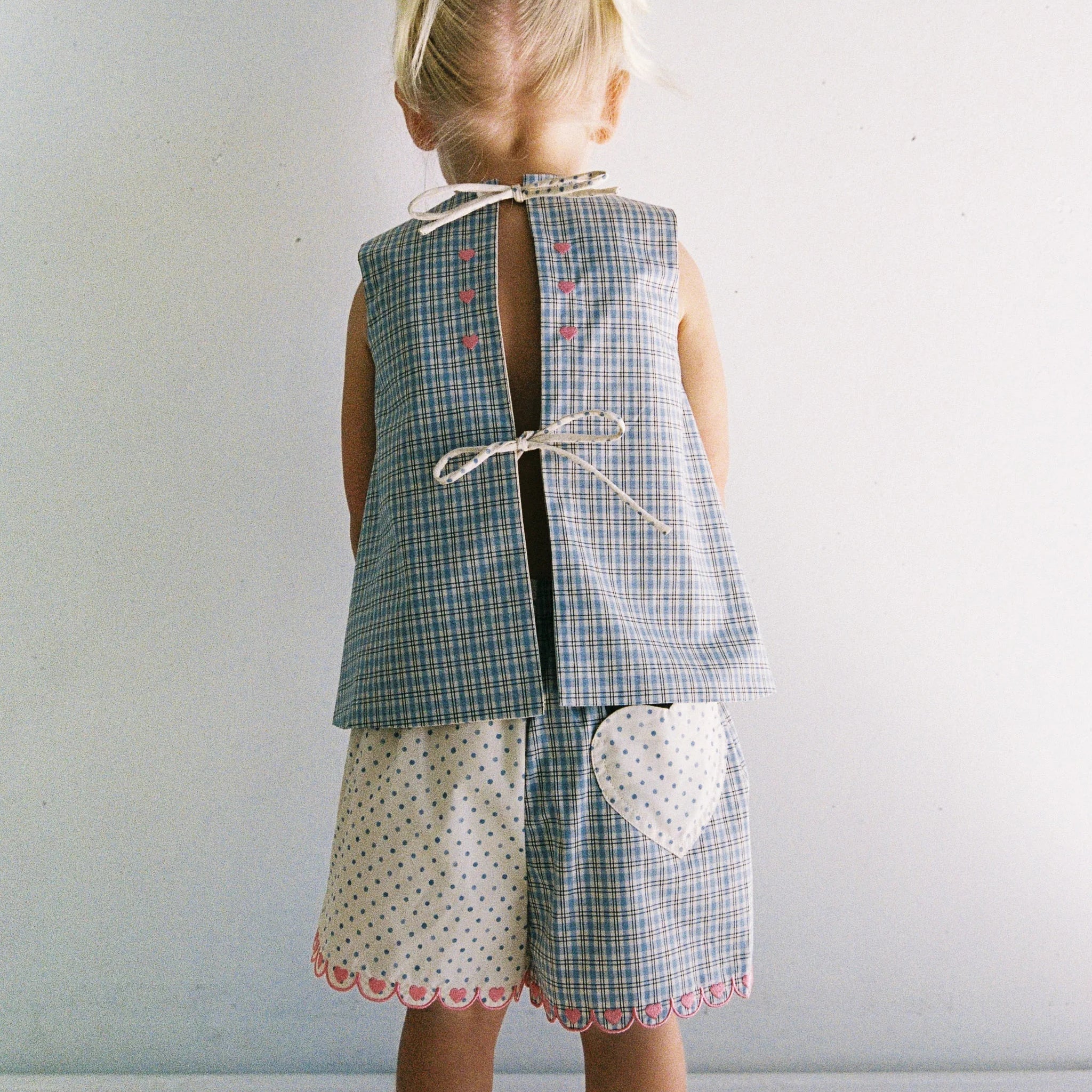 Della Short - blue check by JUNI - with pink scalloped edges