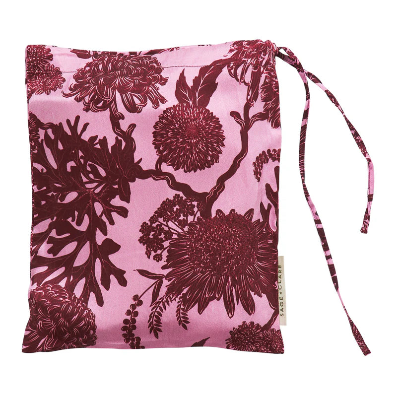 Floral patterned drawstring bag on a white background