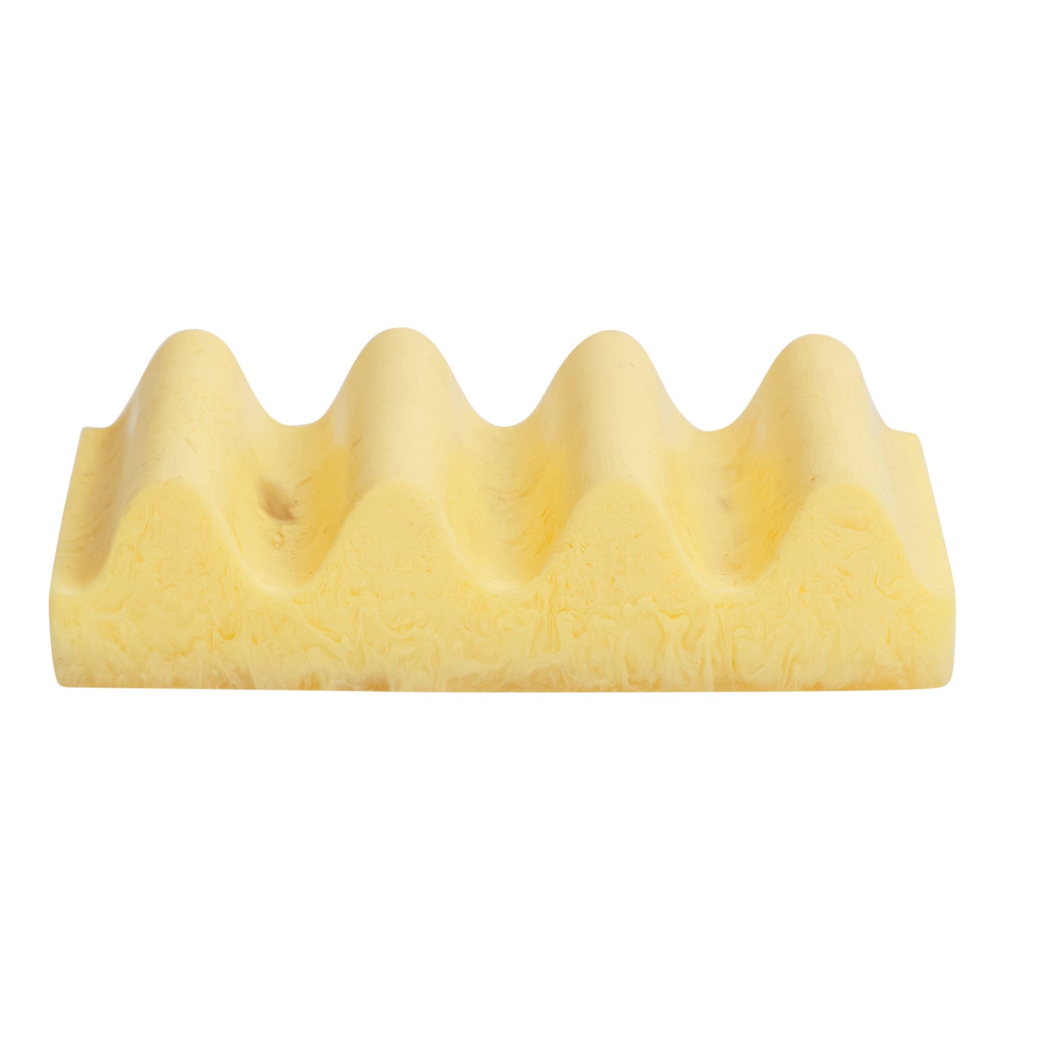 Aspen Gold wave-shaped soap dish in soft yellow marbled resin, front view on white background