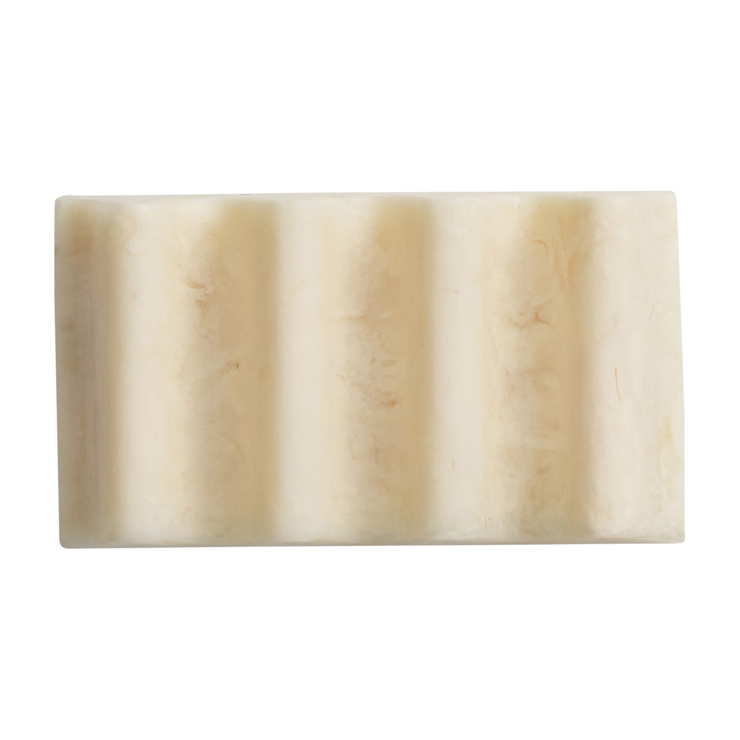 Top-down view of the Pearl soap dish showing its ribbed underside in creamy white marbled resin