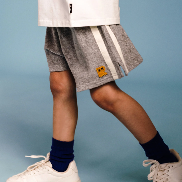 Side view of kid wearing Terry Short - Grey Marle | Rock Your Baby