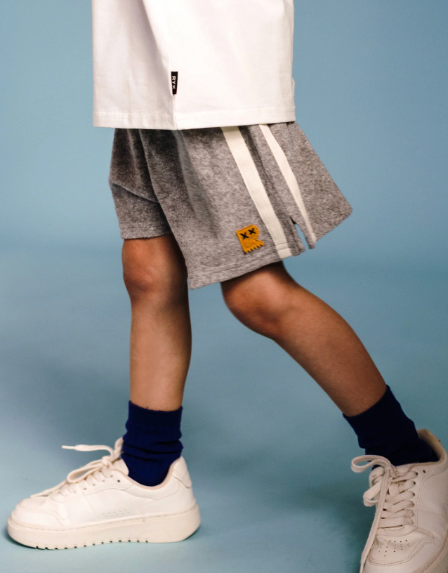 Side view of kid wearing Terry Short - Grey Marle | Rock Your Baby