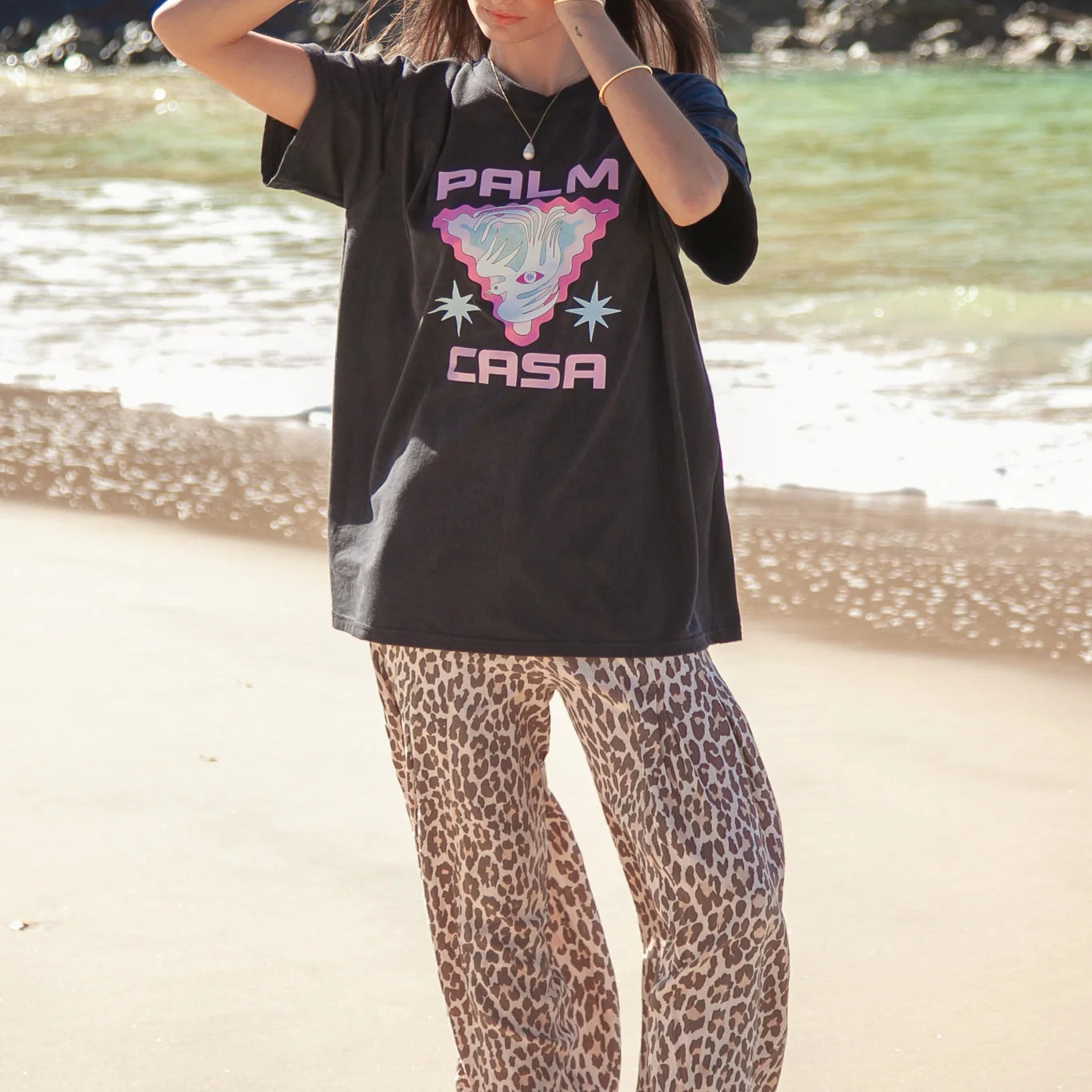 Model wearing Dove Eye T-Shirt by Palm Collective