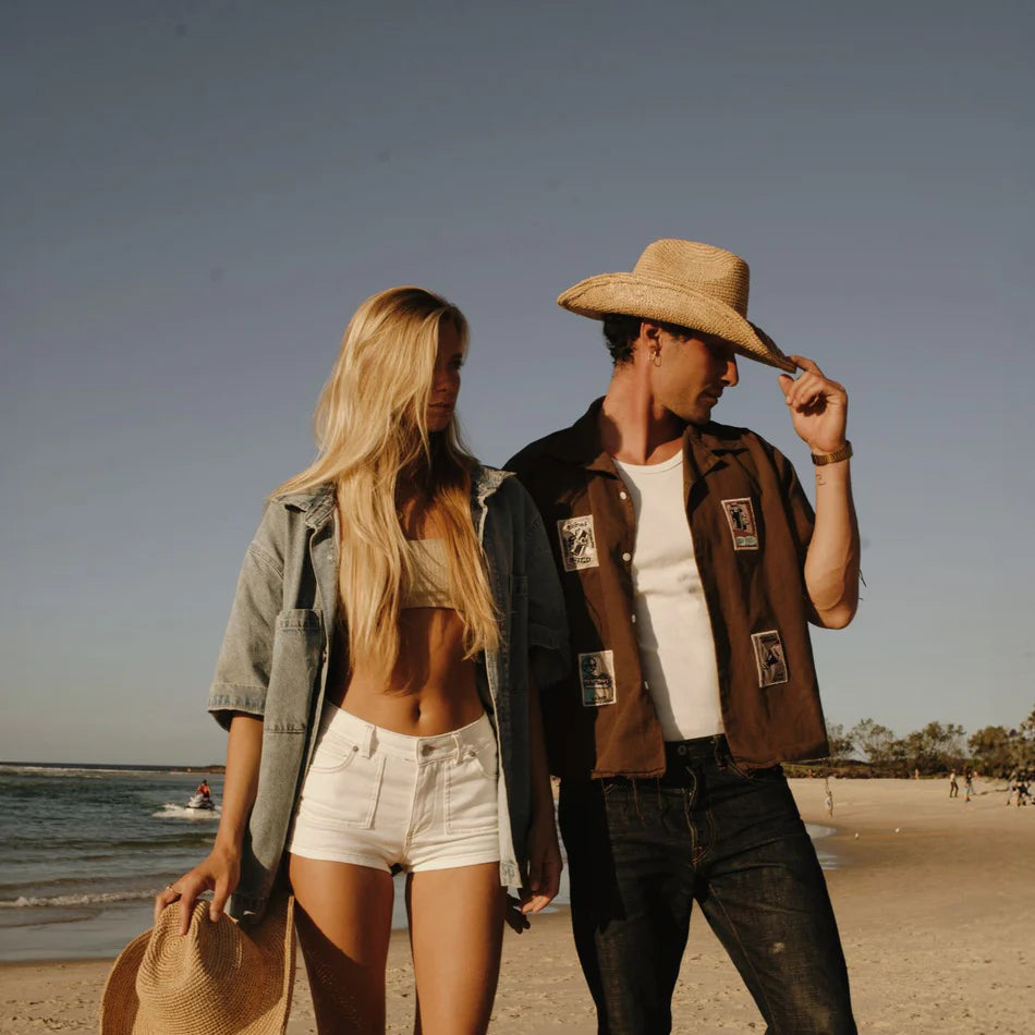 man wearing Duke Straw Raffia Cowboy Hat by Will & Bear