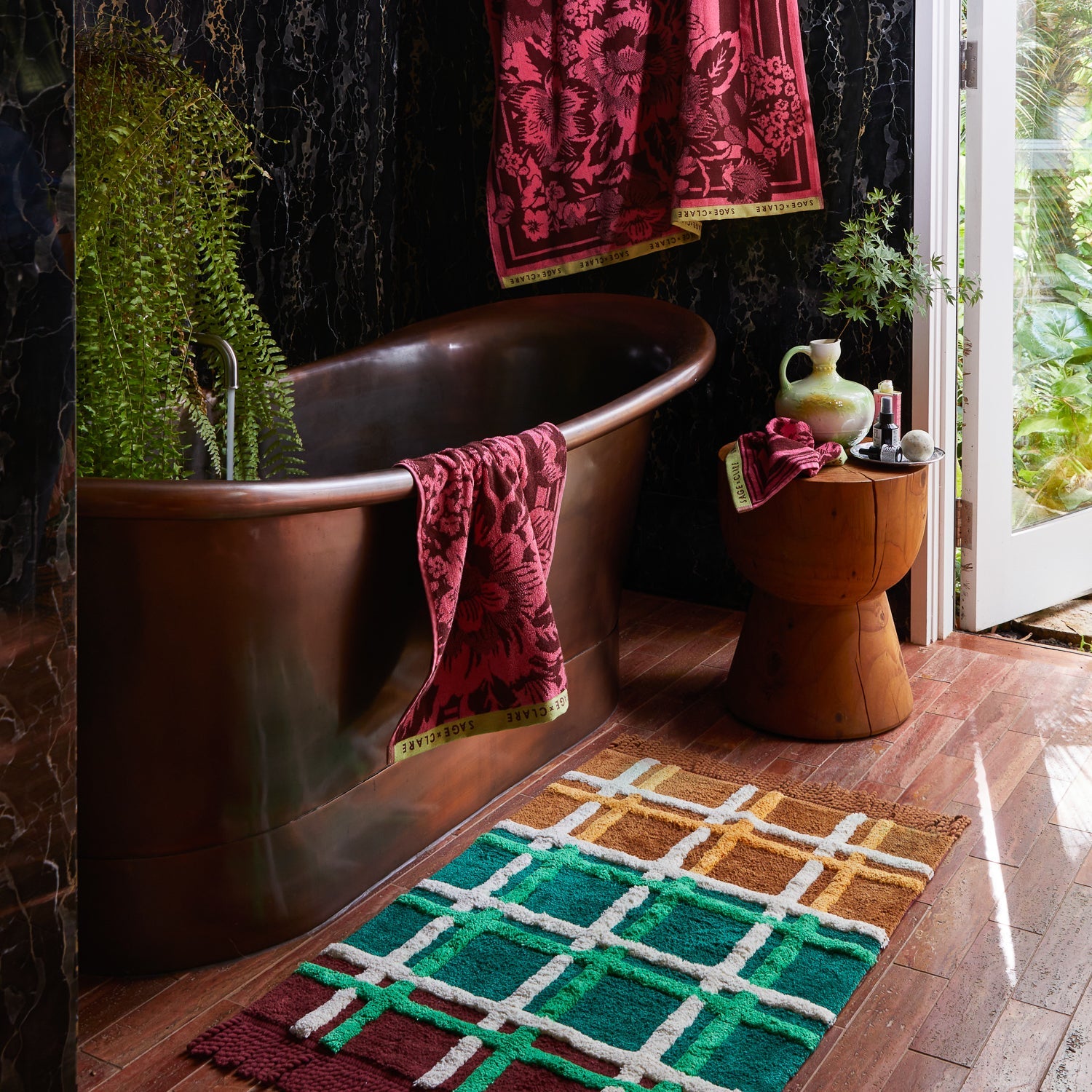 Sage & Clare Eliza hand towel in primrose yellow hanging in modern bathroom lifestyle setting