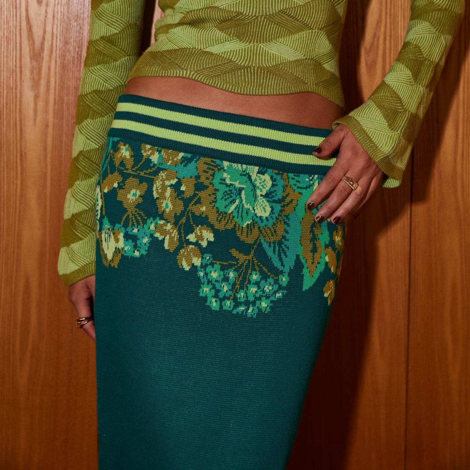 Model wearing Eliza Knit Maxi Skirt in relaxed pose showing full outfit coordination