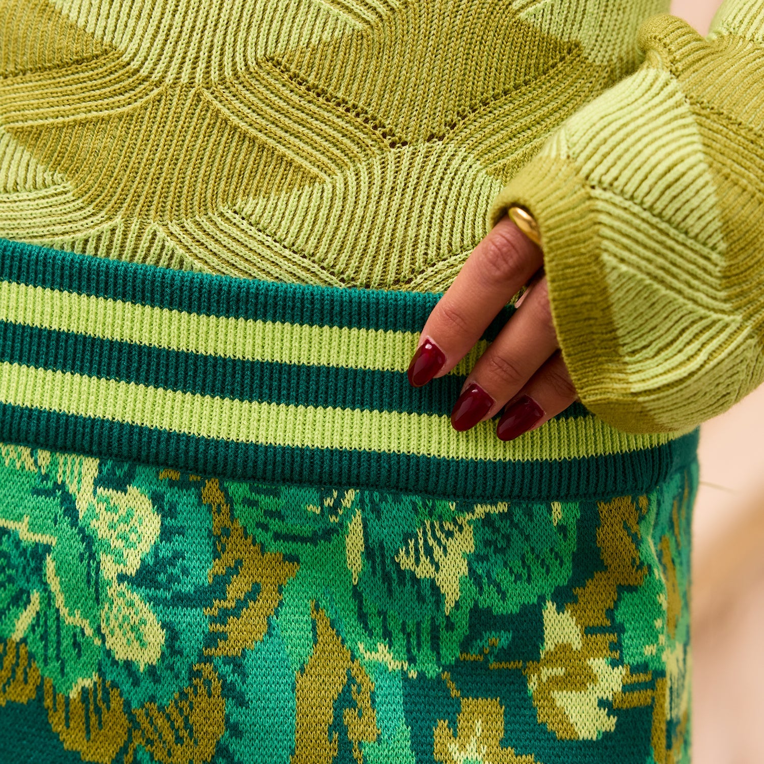 Front view of Sage Clare Eliza Knit Maxi Skirt showing full length silhouette with floral pattern
