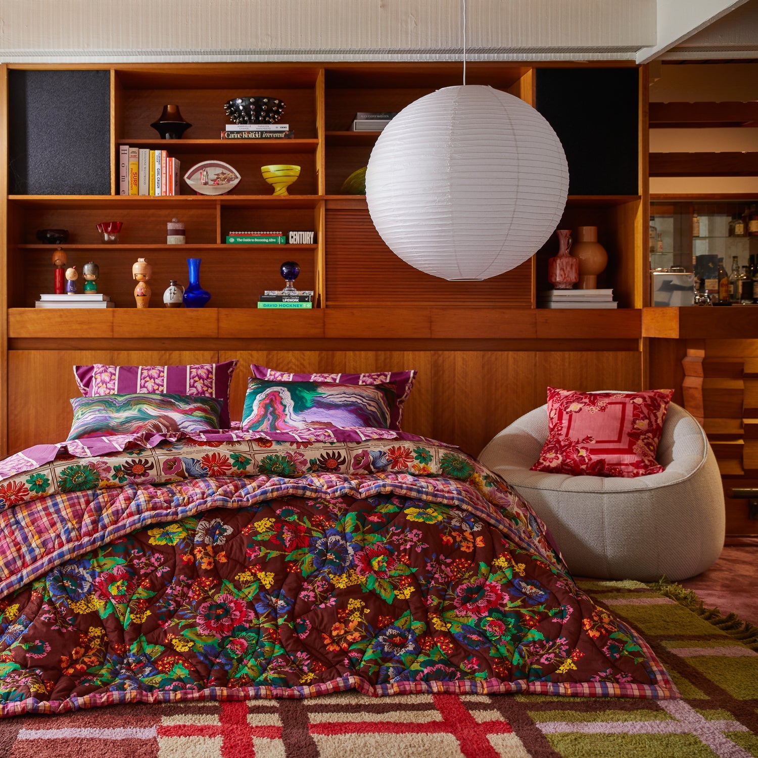 Eliza Silk-Linen Cushion styled in modern bedroom with complementary colorful bedding and decor