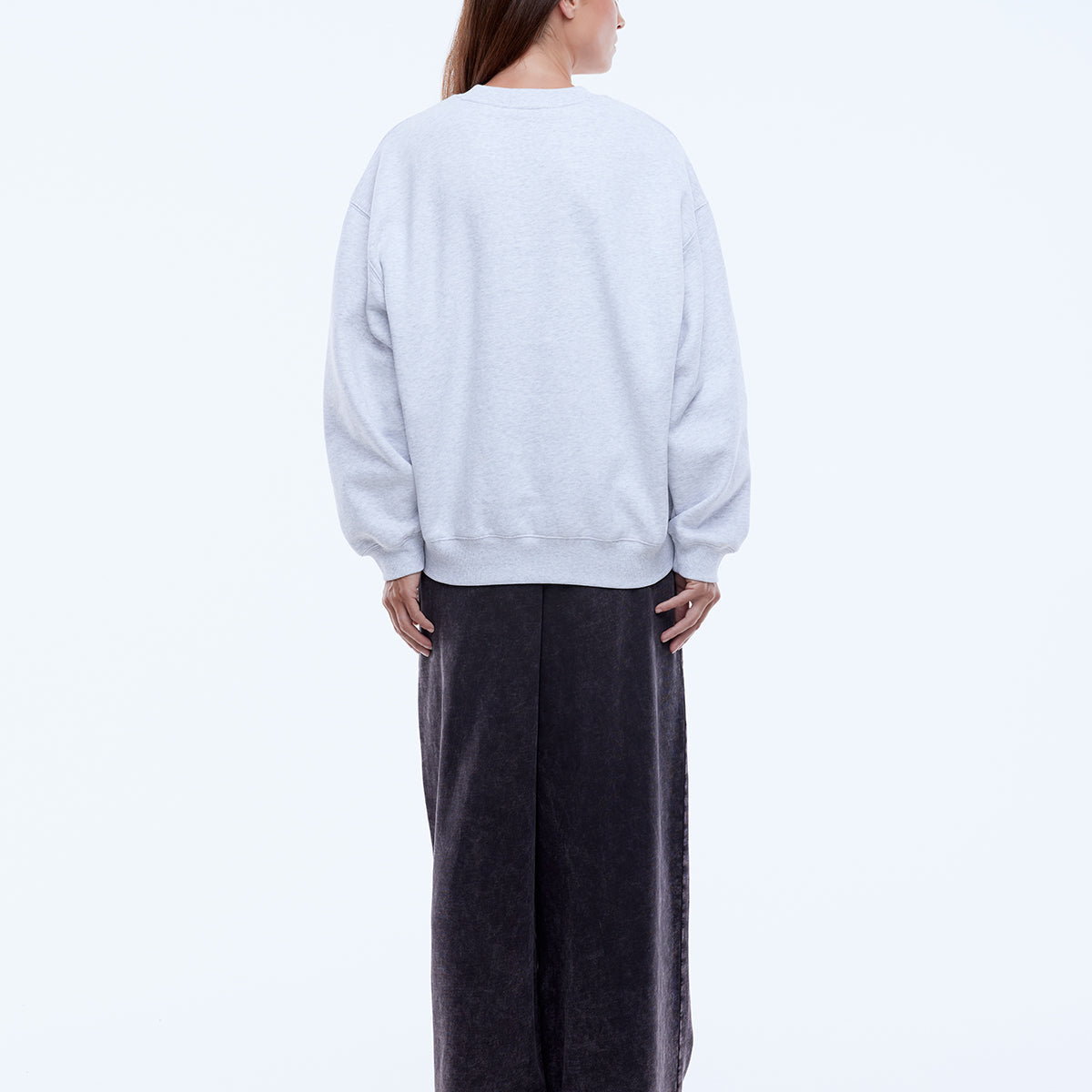 Cotton rich fleece fabric texture detail of Ena Pelly white marle sweatshirt with recycled materials