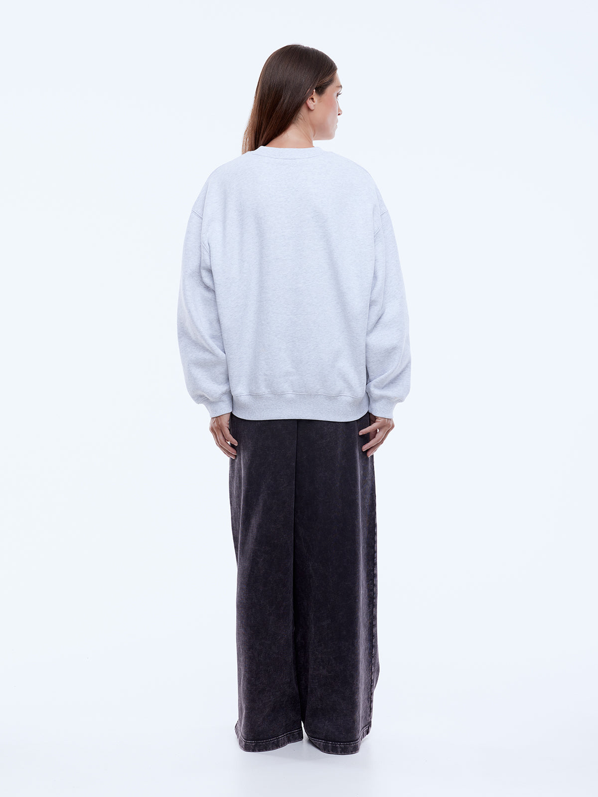 Cotton rich fleece fabric texture detail of Ena Pelly white marle sweatshirt with recycled materials