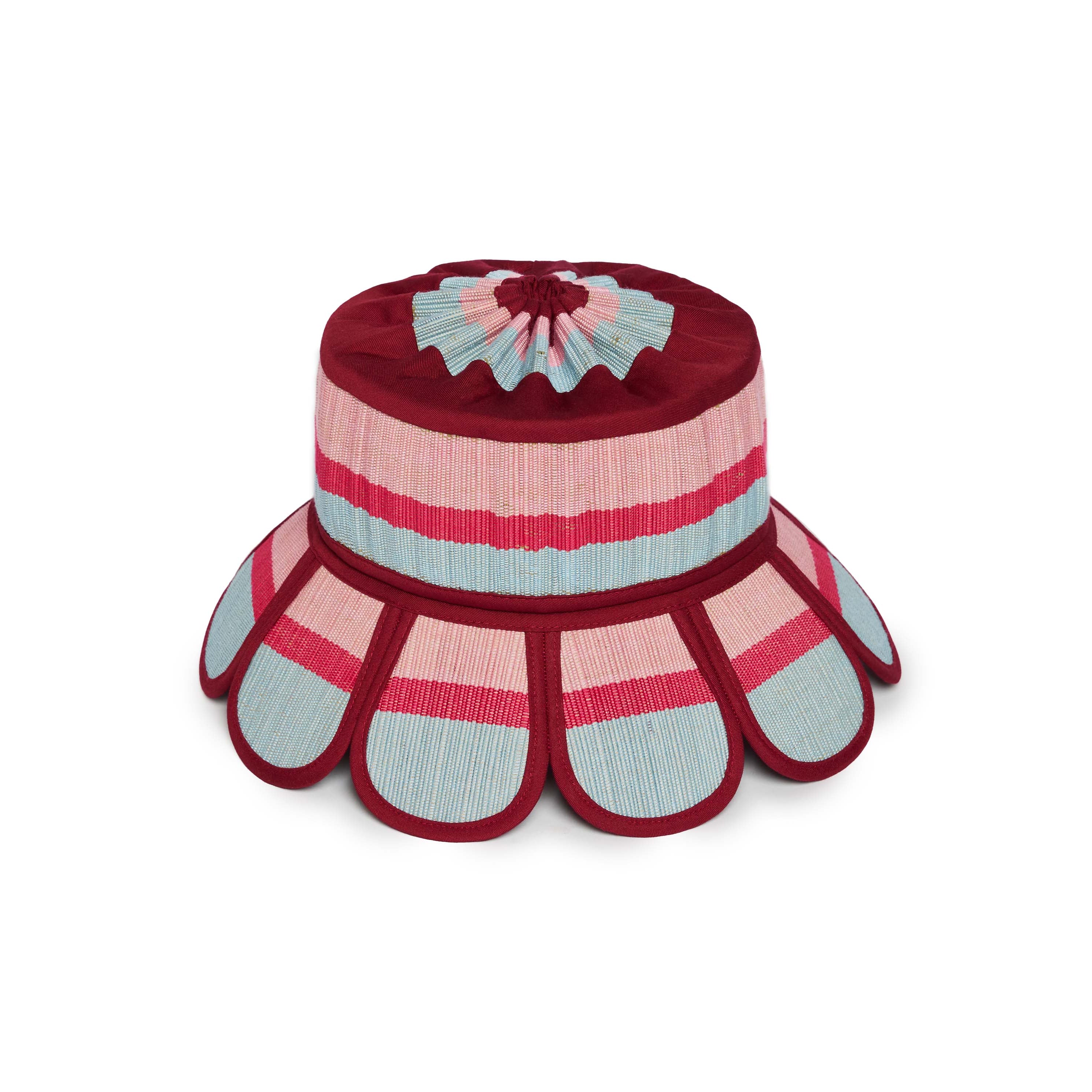 Flat lay view of Luxe Manhattan Hat showing scalloped brim design with burgundy pink and blue striped pattern