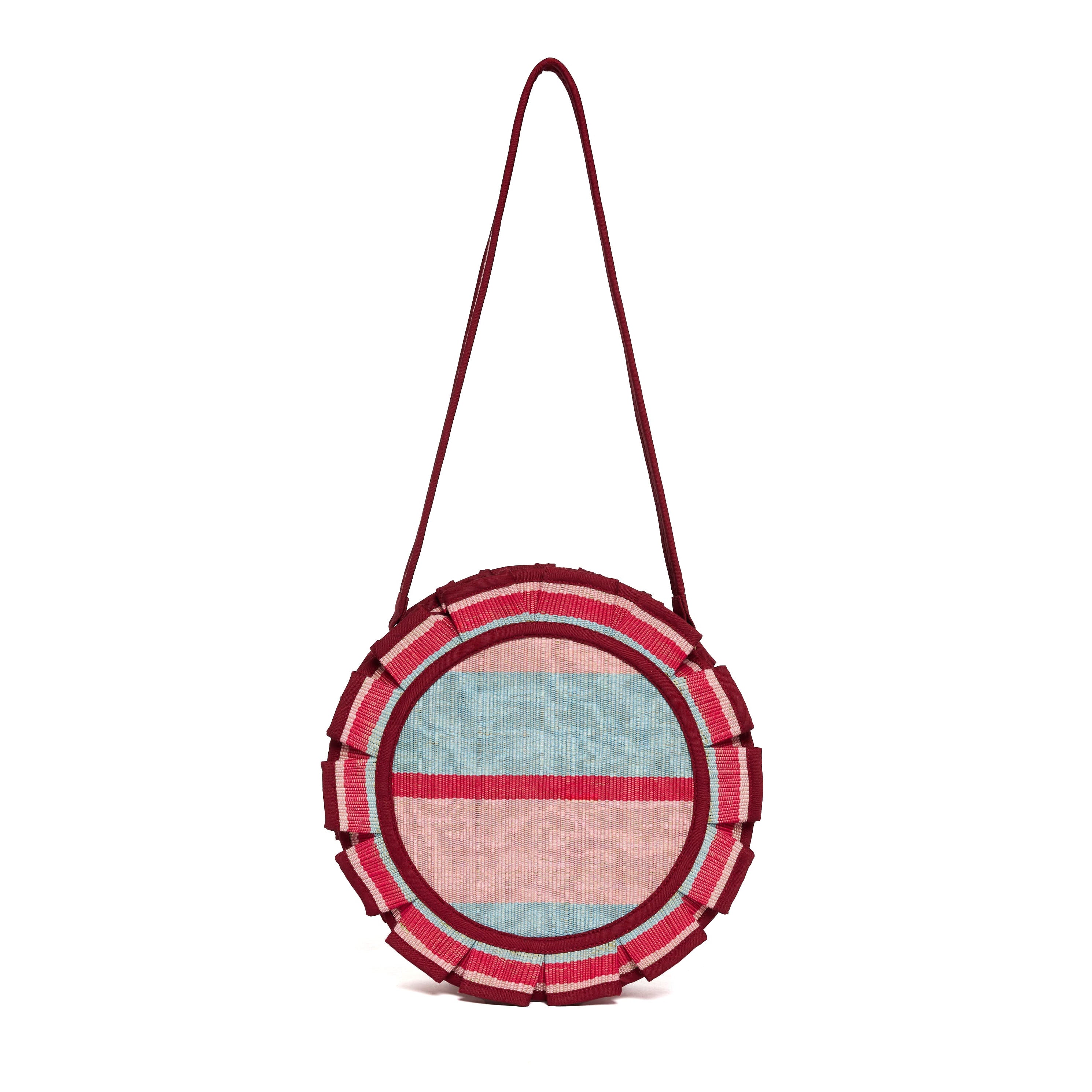 Front view of Escape Mini Love Note Tote featuring blue pink burgundy striped circular design with fringe trim