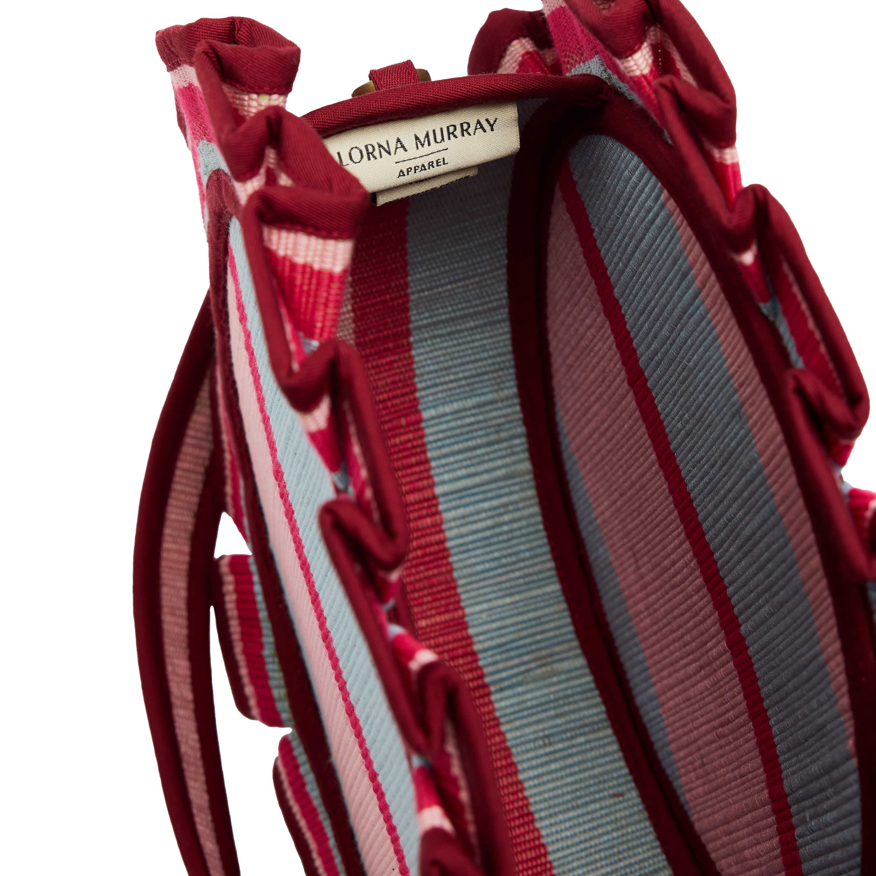Close-up interior view of Lorna Murray tote showing striped lining and brand label detail