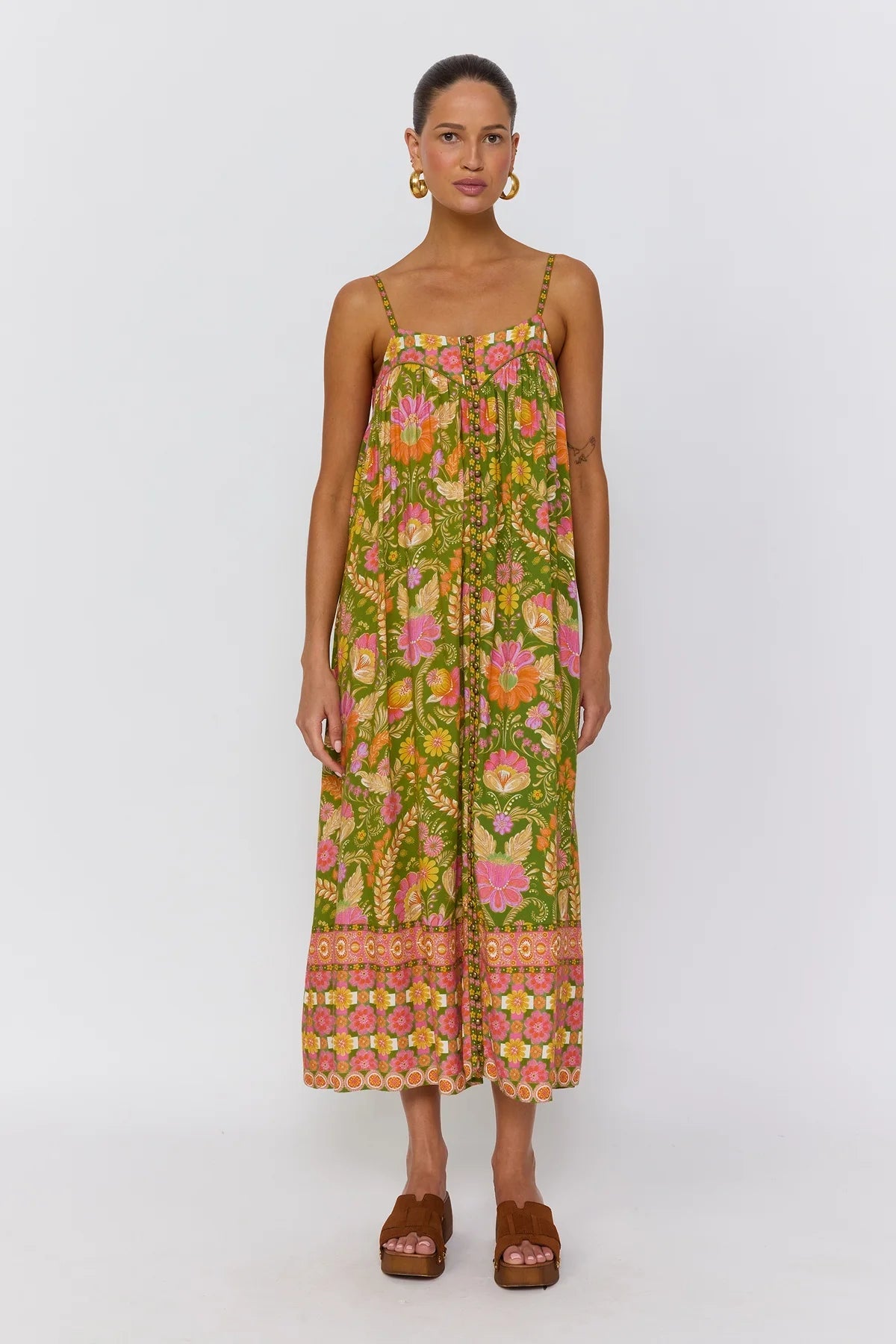 Estella dress guava ruffle hem detail close up showing graceful movement and flowy fabric drape