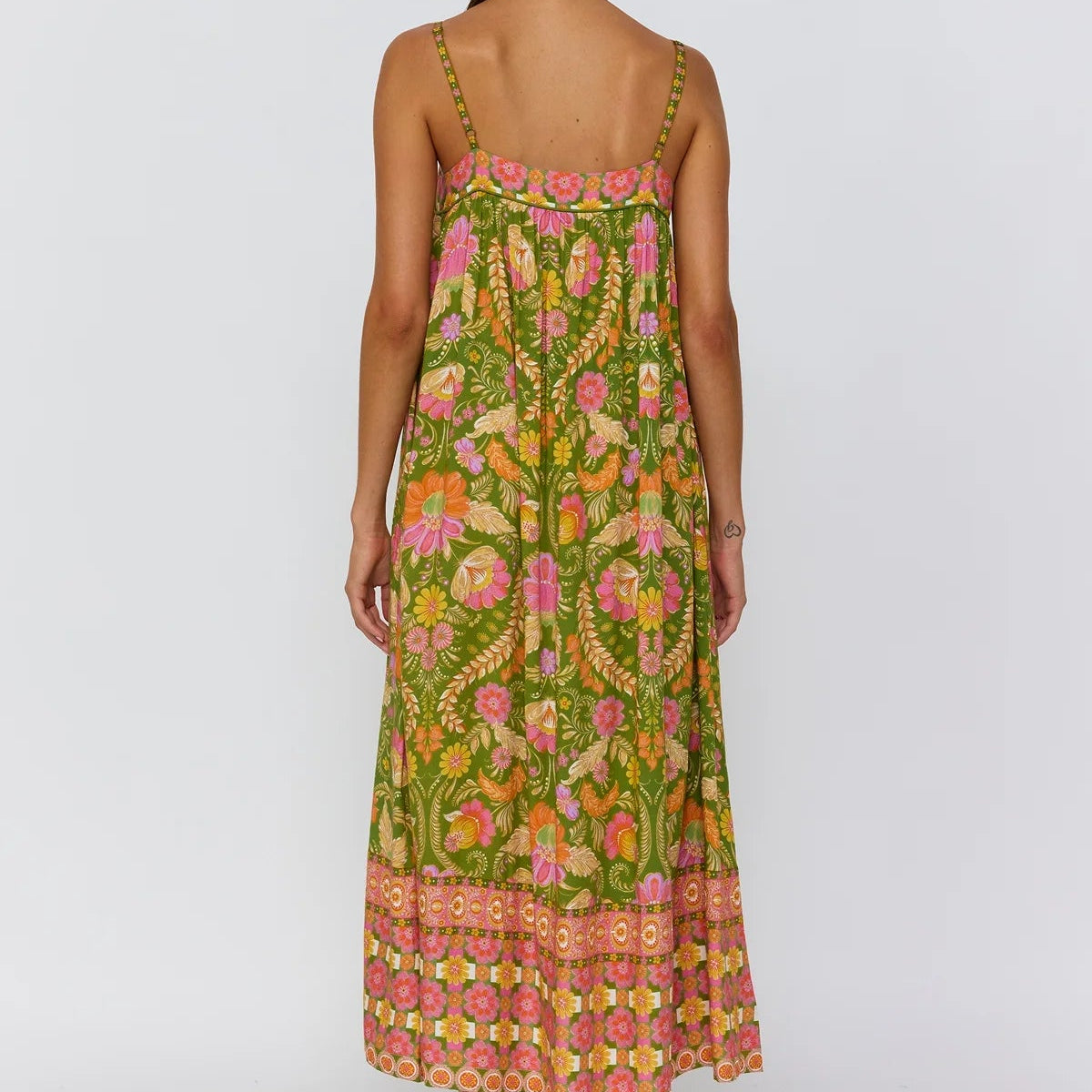 Model wearing Nine Lives Bazaar Estella dress guava in lifestyle setting perfect for summer outings