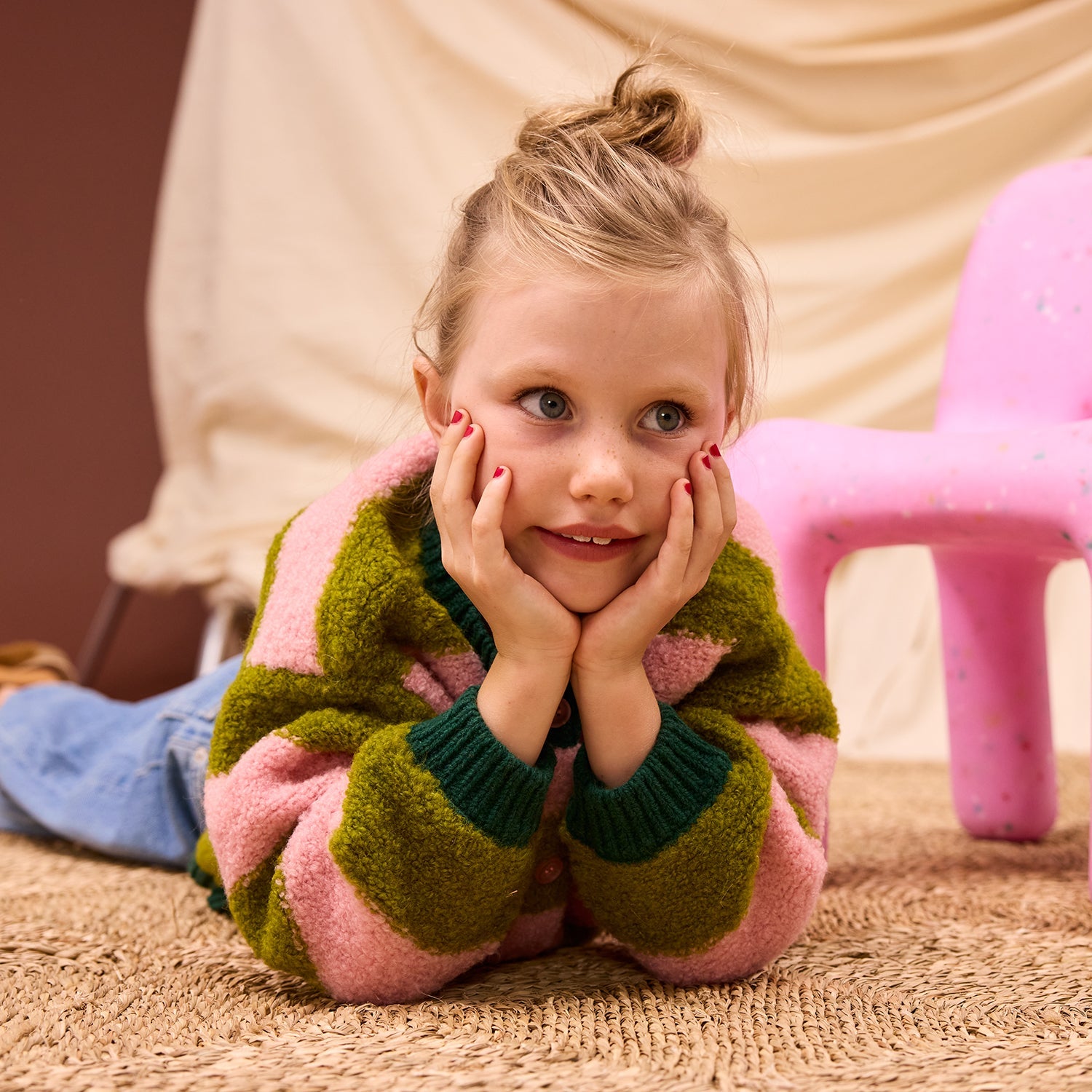 Front view close-up showing chunky boucle texture and stripe pattern on Estrid Kids Cardigan by Sage & Clare