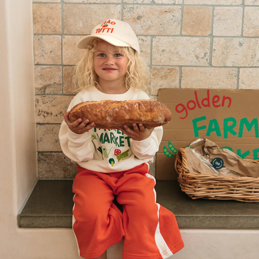 Child wearing Farmers market Sweater Buttercream by Golden Children