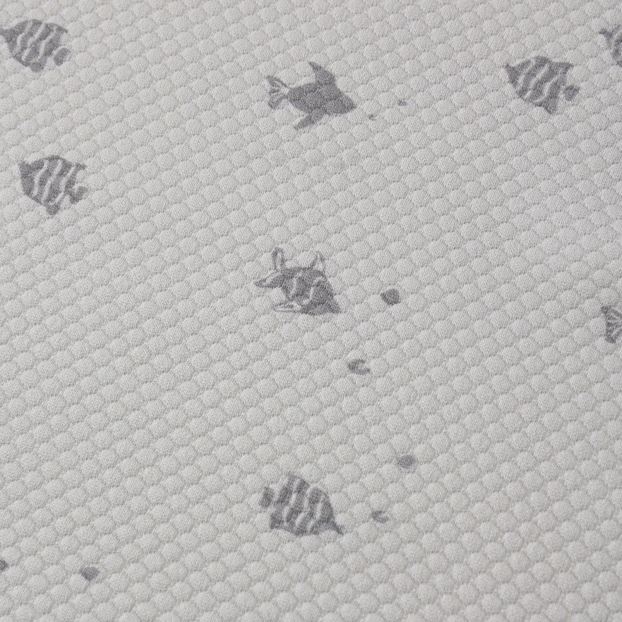 Close up fabric on rashguard on the Finn Rashguard + Short Set Fish | Quincy Mae