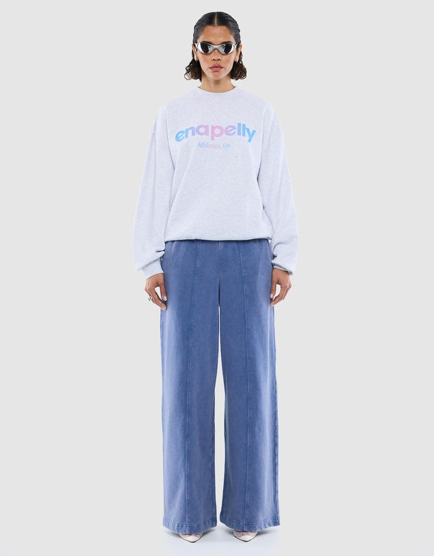 white Ena pelly sweater with pastel coloured logo