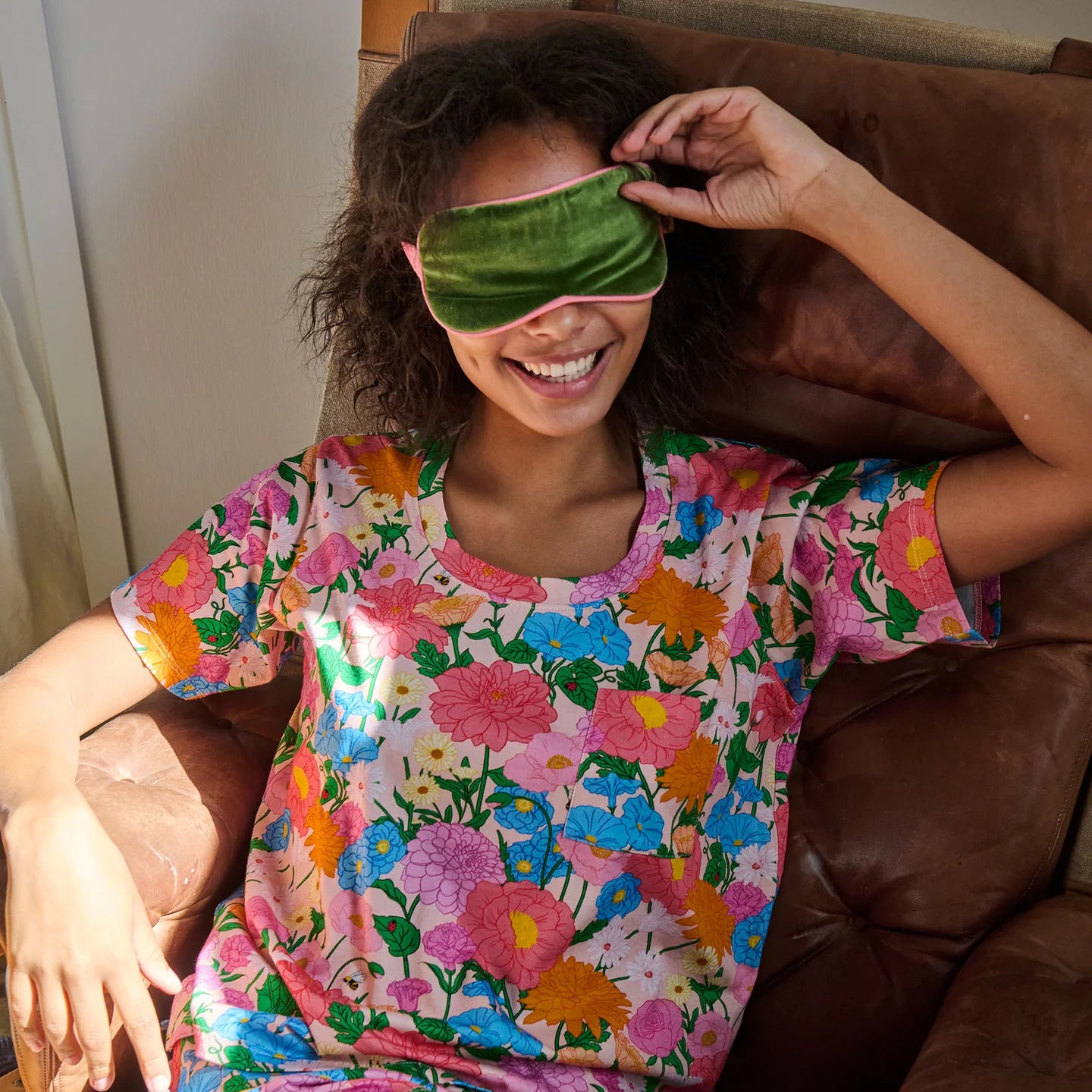 model wearing a women's multicolour floral cotton pyjama set by Kip & Co