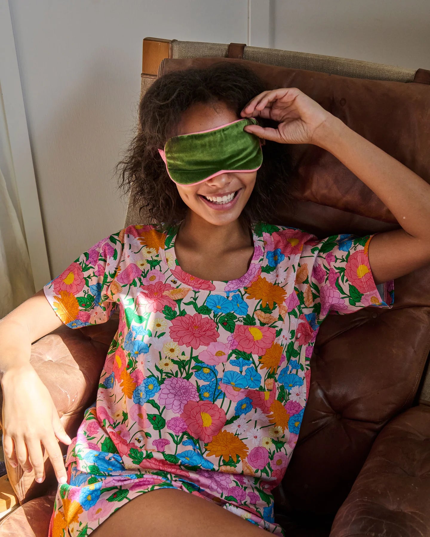 model wearing a women's multicolour floral cotton pyjama set by Kip & Co