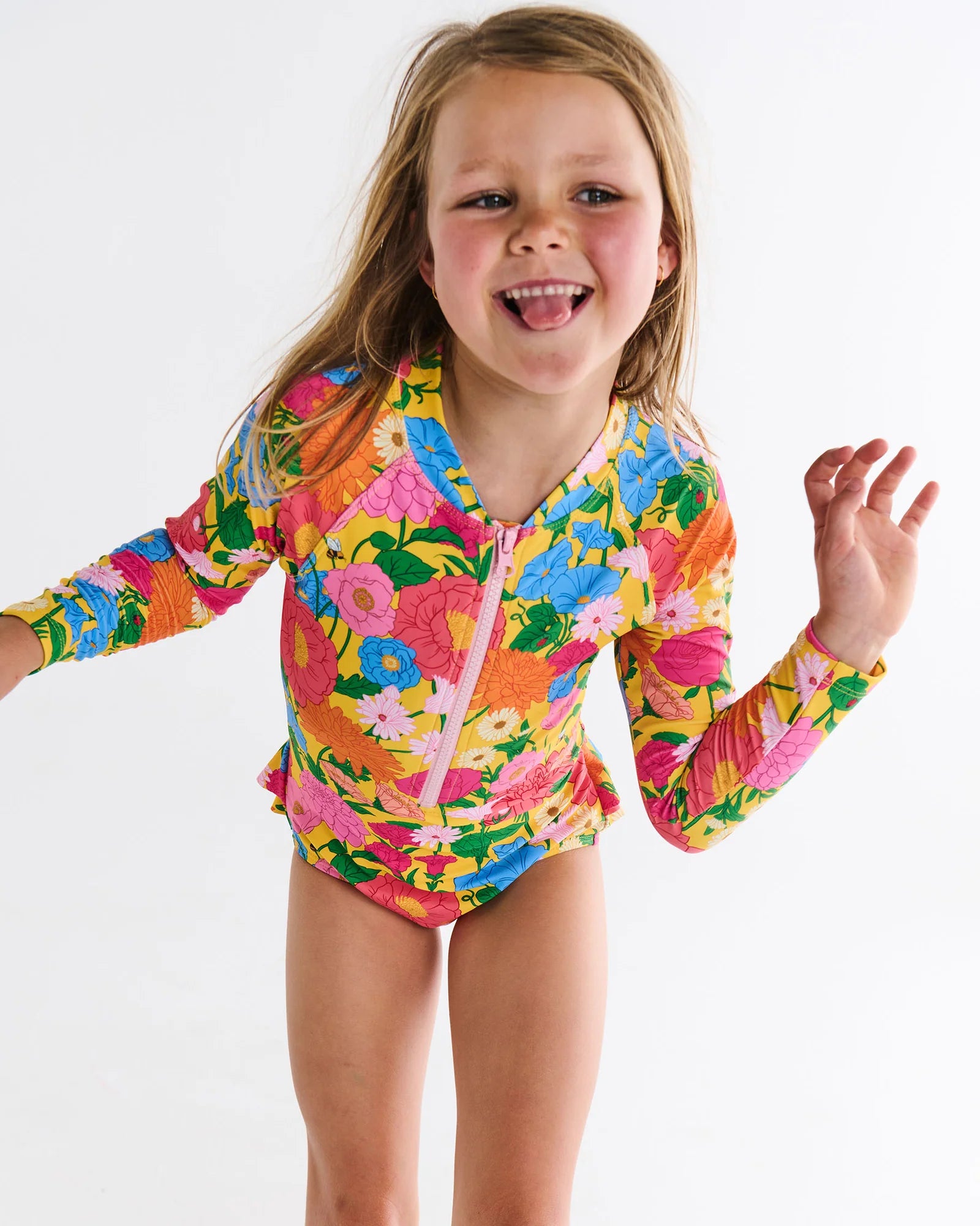 Girl wearing Follow The Sun Yellow Long Sleeve Bathers by Kip & Co