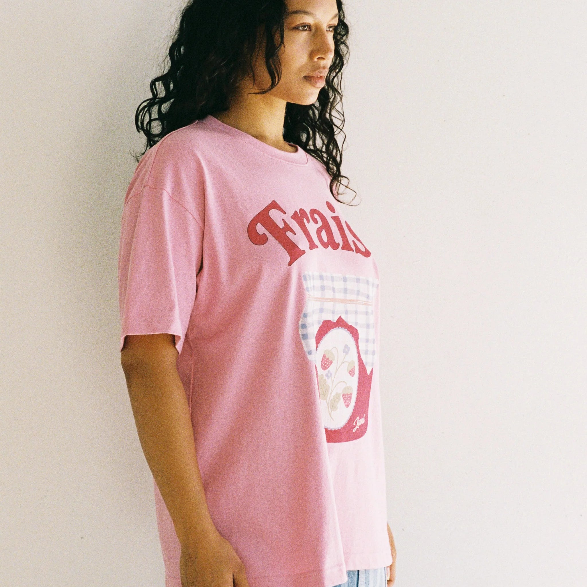 model wearing the pink Fraise Tee by Juni