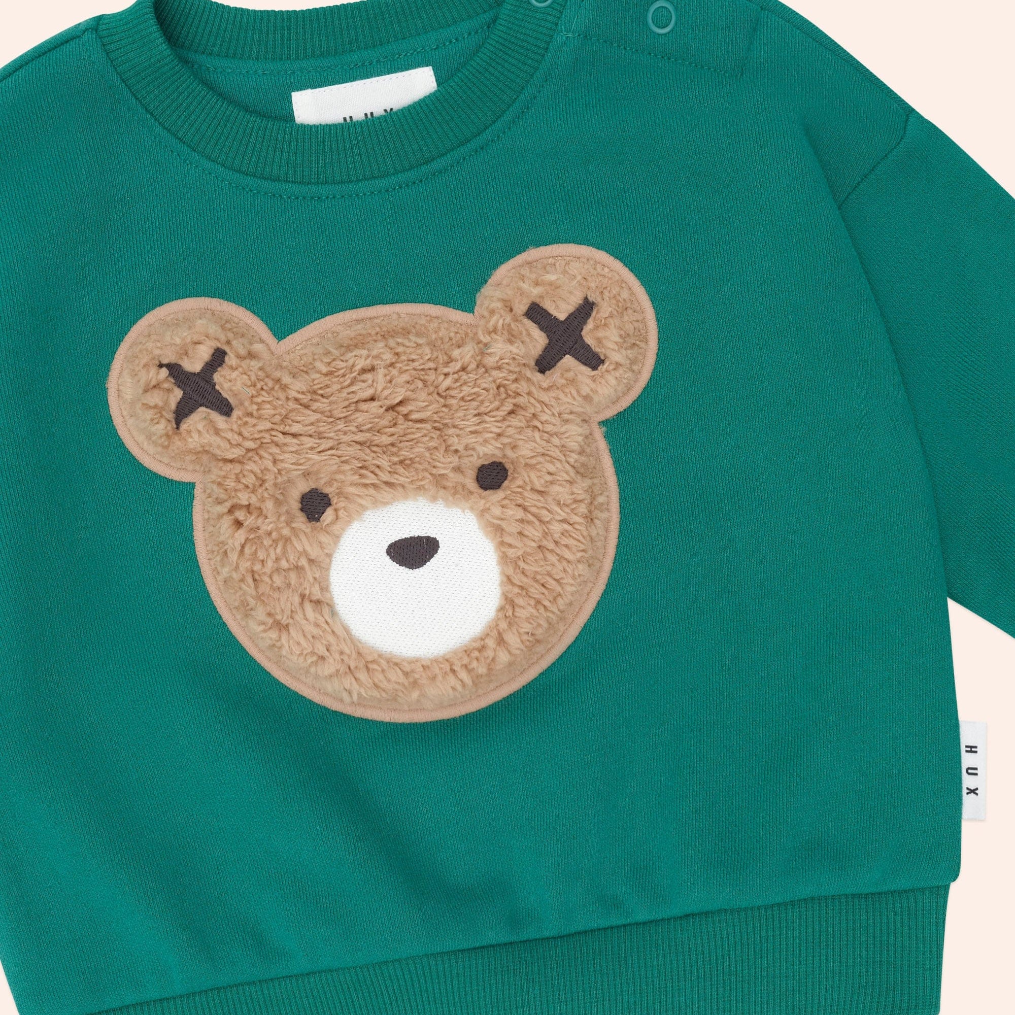 Close up of the Furry Huxbear Emerald Sweatshirt | Huxbaby