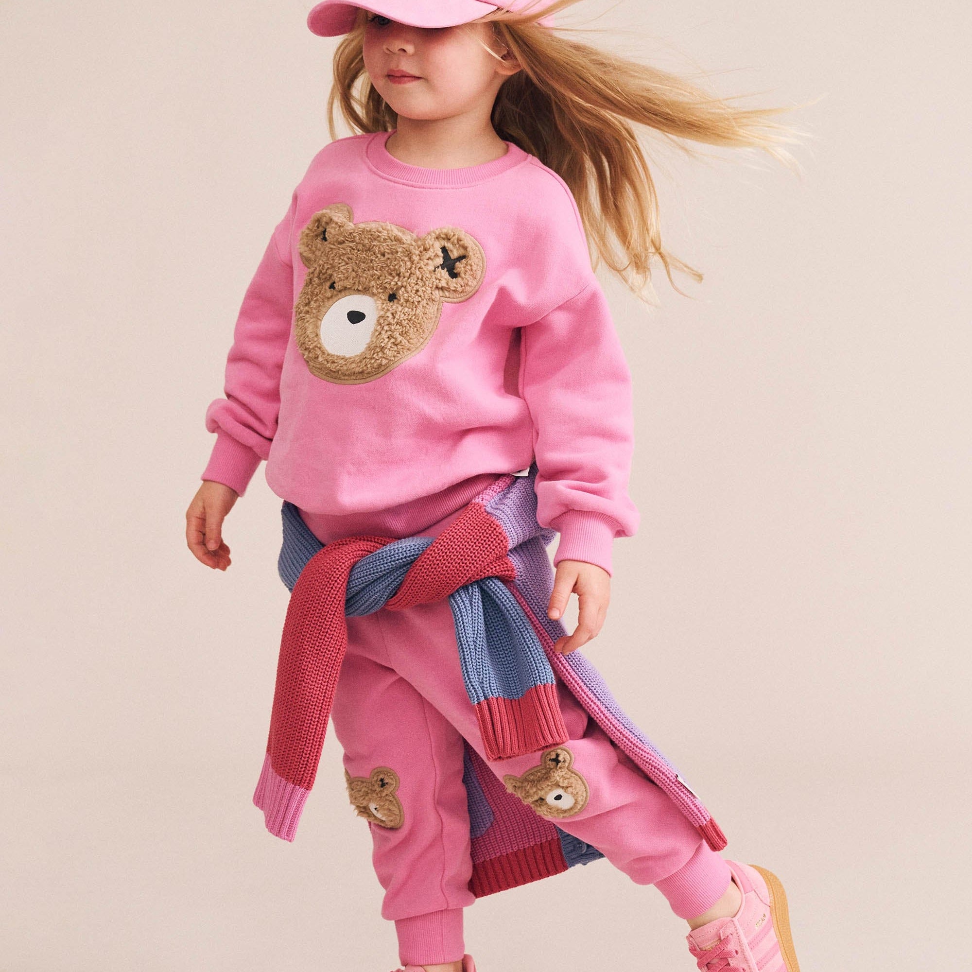 Young girl wearing the Furry Huxbear Sweatshirt | Huxbaby