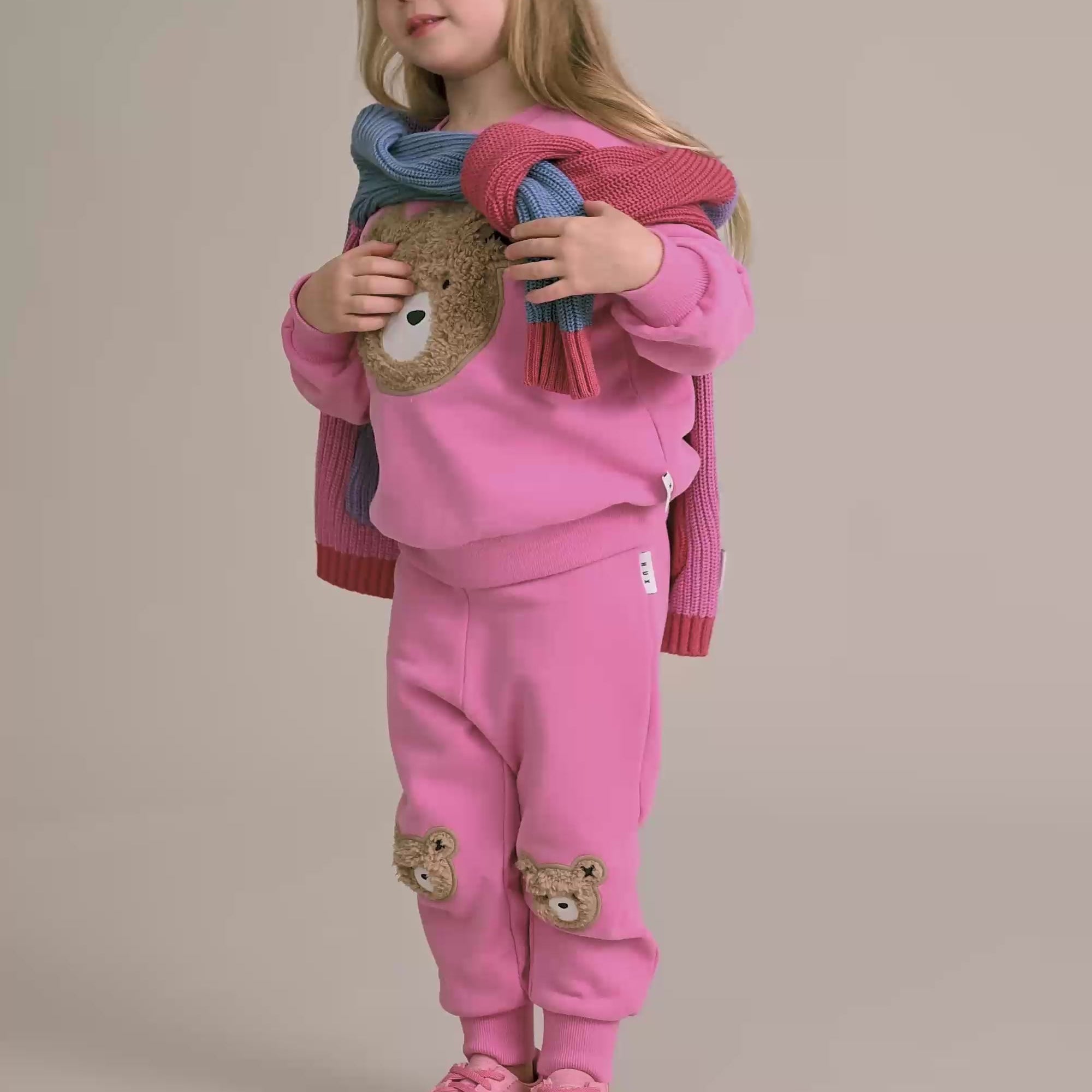 Kid wearing the pink Furry Huxbear Sweatshirt | Huxbaby