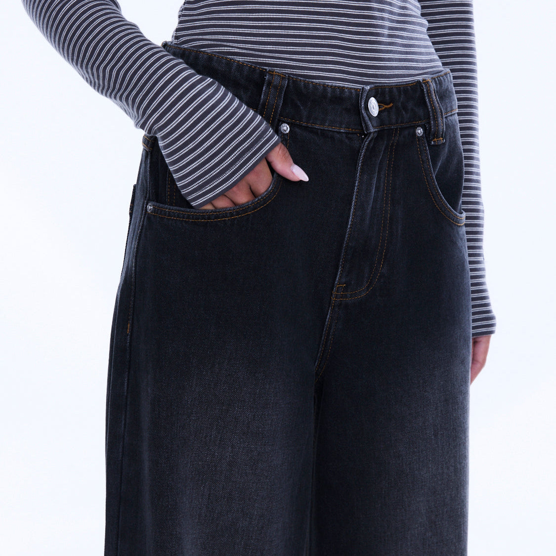 Close-up front view of Georgia Denim Jean showing dark wash wide leg fit with button closure and pockets