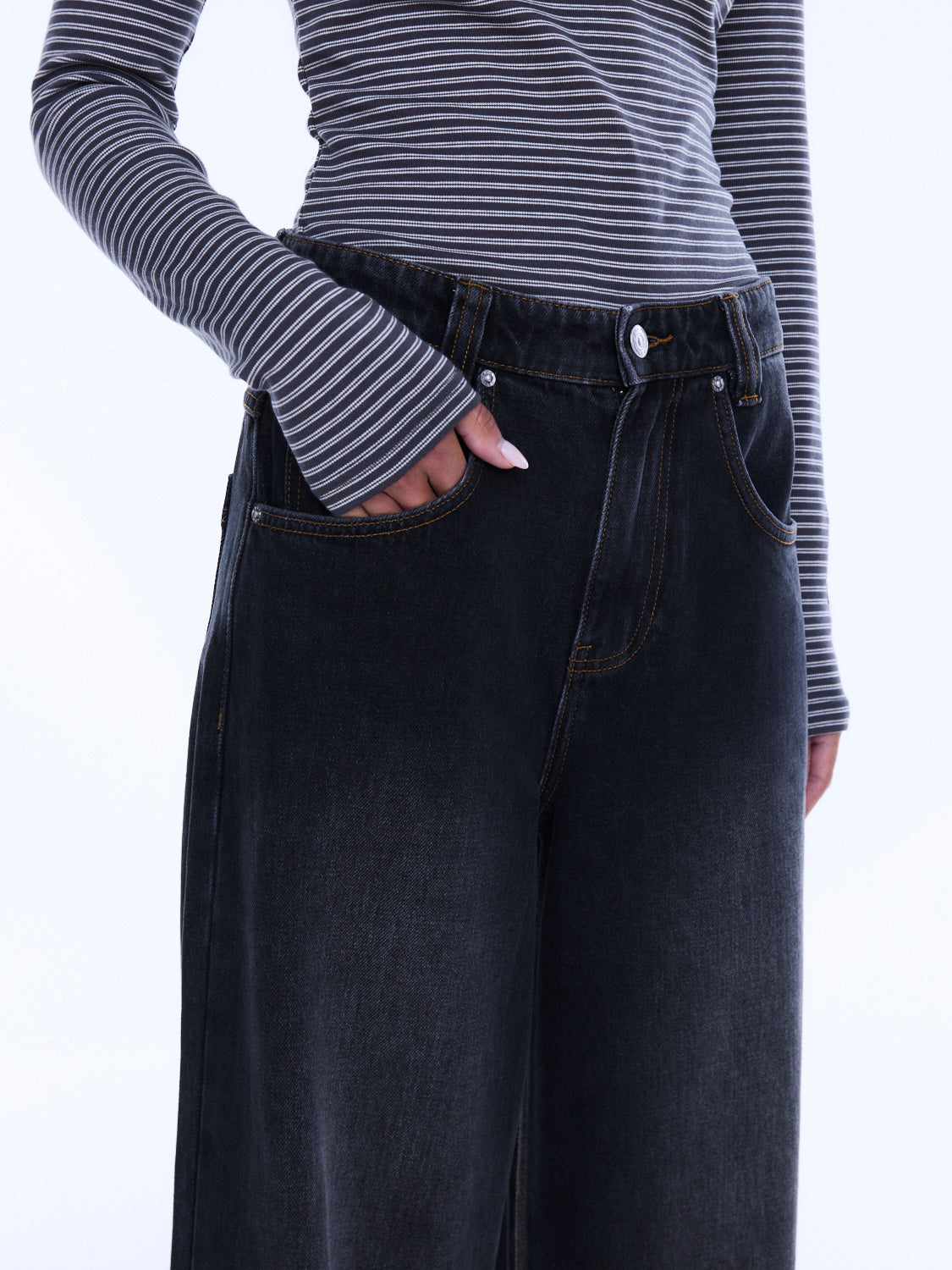 Close-up front view of Georgia Denim Jean showing dark wash wide leg fit with button closure and pockets