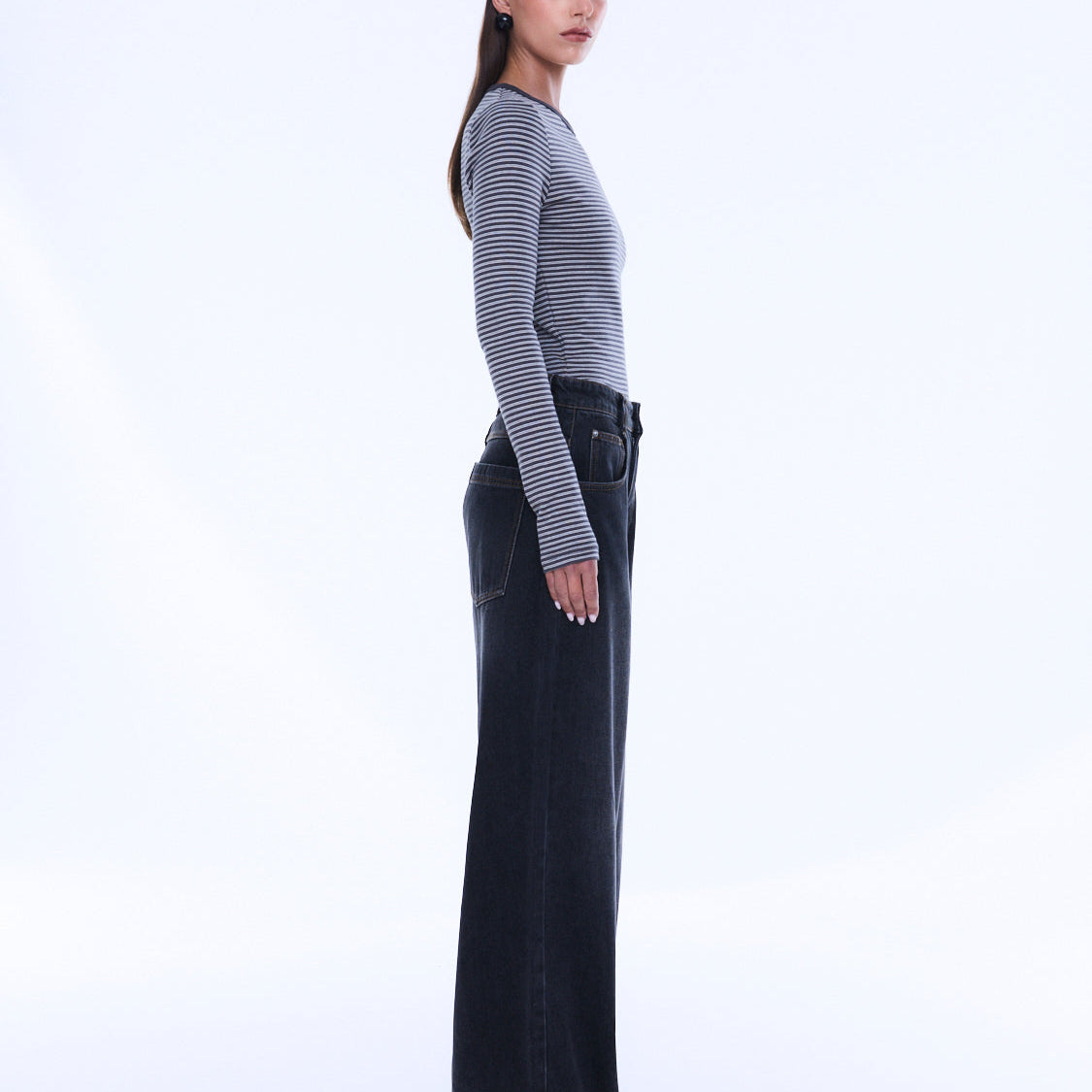 Side profile of Georgia Denim Jean displaying full length wide leg silhouette and relaxed fit