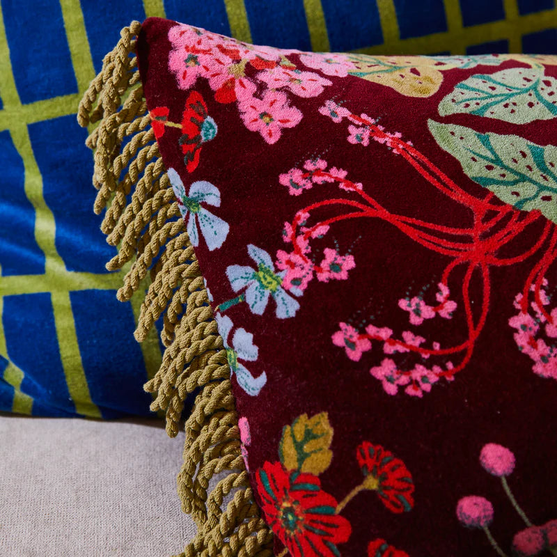 Genevieve Velvet Bolster Cushion by Sage & Clare with burgundy floral pattern