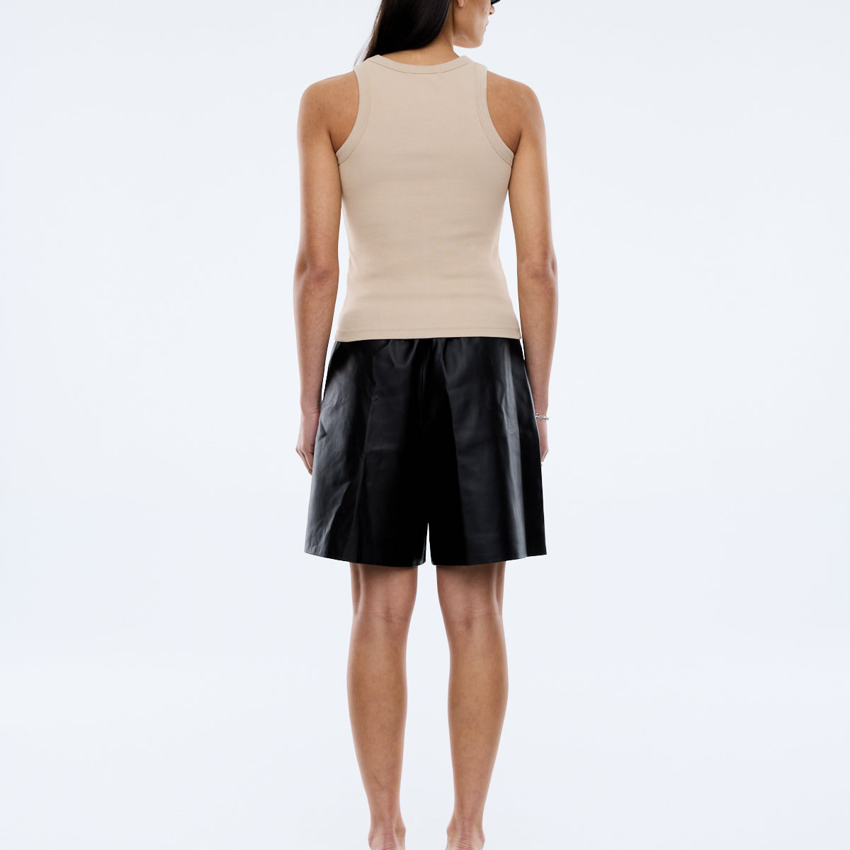 back view of model wearing Georgia Tank – Oat by Ena Pelly