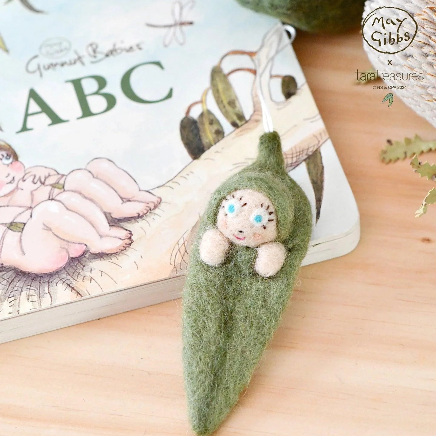 Tara Treasures in collaboration with May Gibbs have created this gorgeous hand-felted snuggle pot cuddlepie hanging ornament