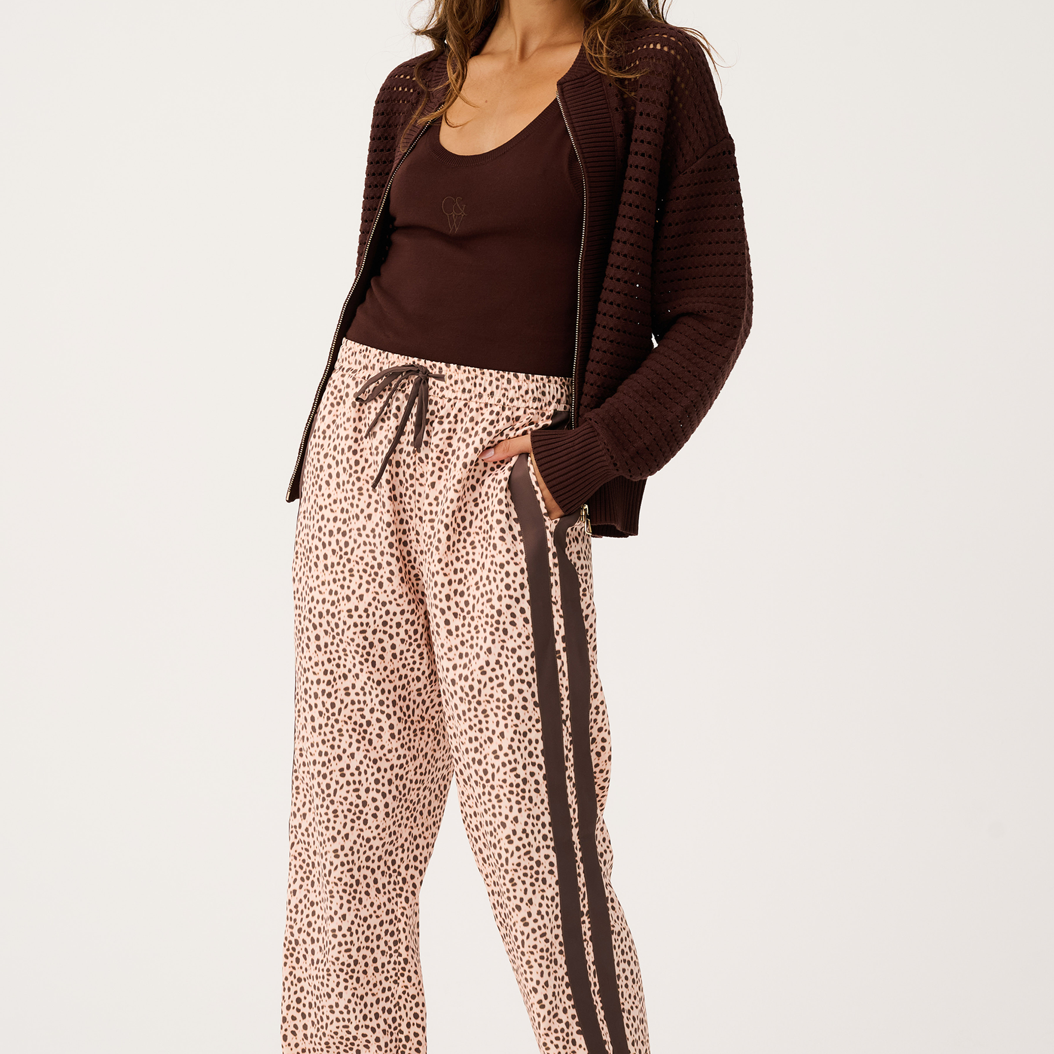 Front view of Heidi Pant showing ocelot print pattern with brown contrast side stripes