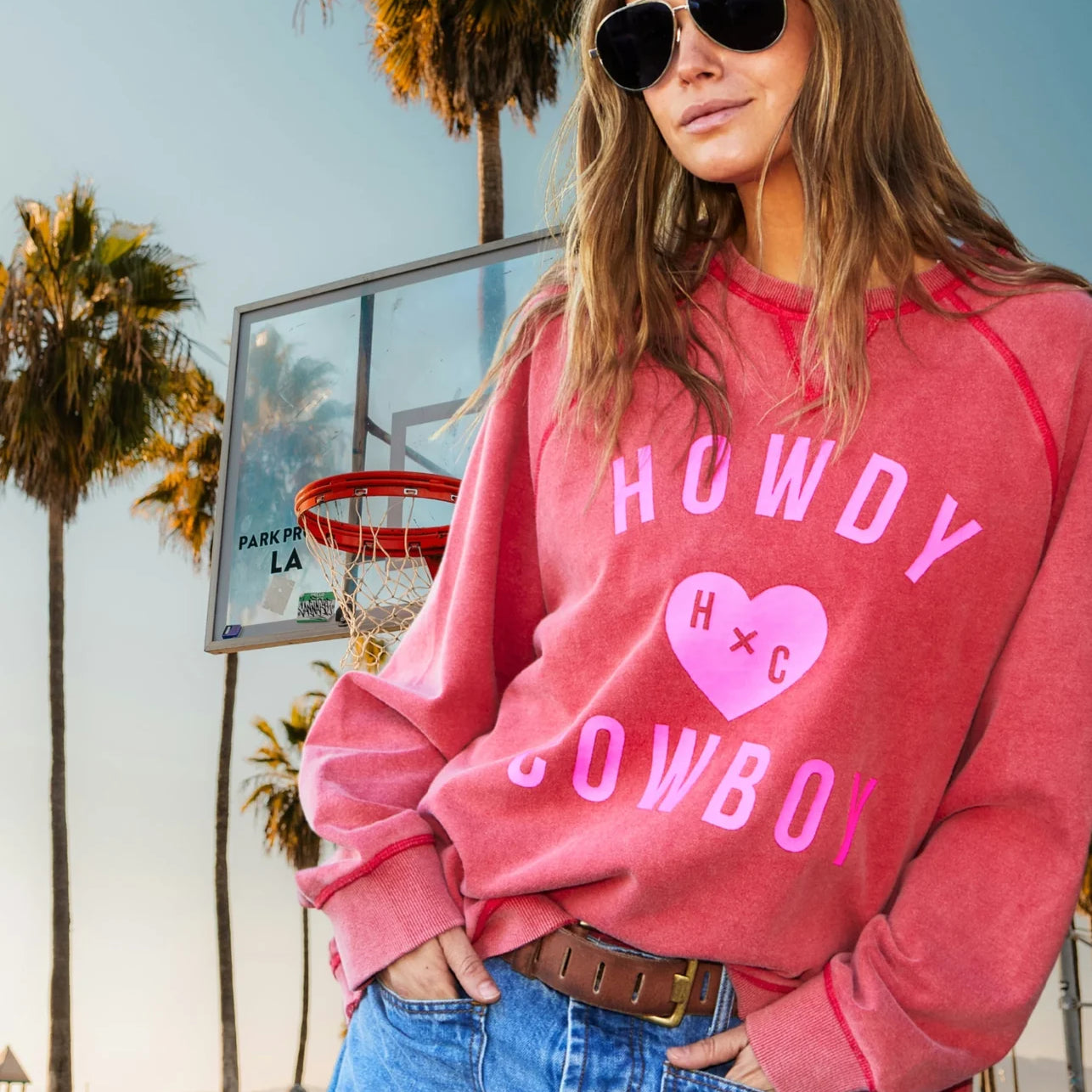 model wearing Howdy Cowboy Vintage wash sweats - Red by Hammill & Co