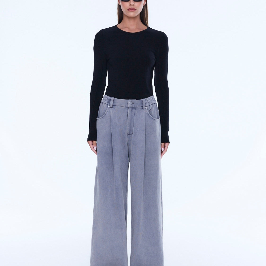 Full front view of dove grey jersey wide leg pants with elastic waist and relaxed fit