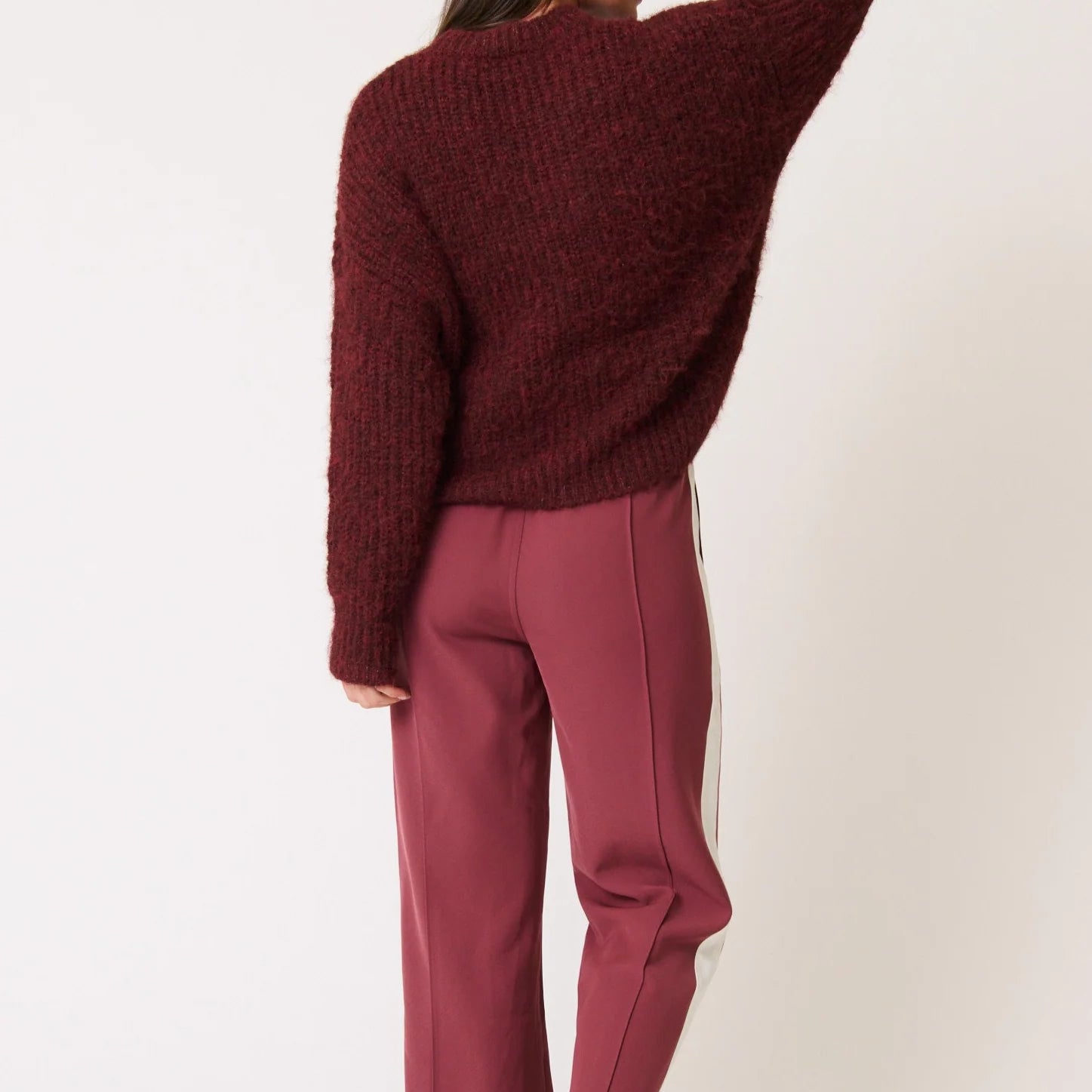 back view of model wearing Indica Pants Plum by Cartel & Willow