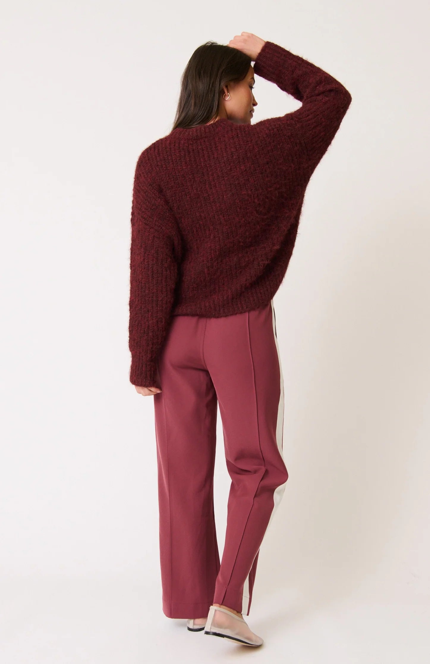 back view of model wearing Indica Pants Plum by Cartel & Willow