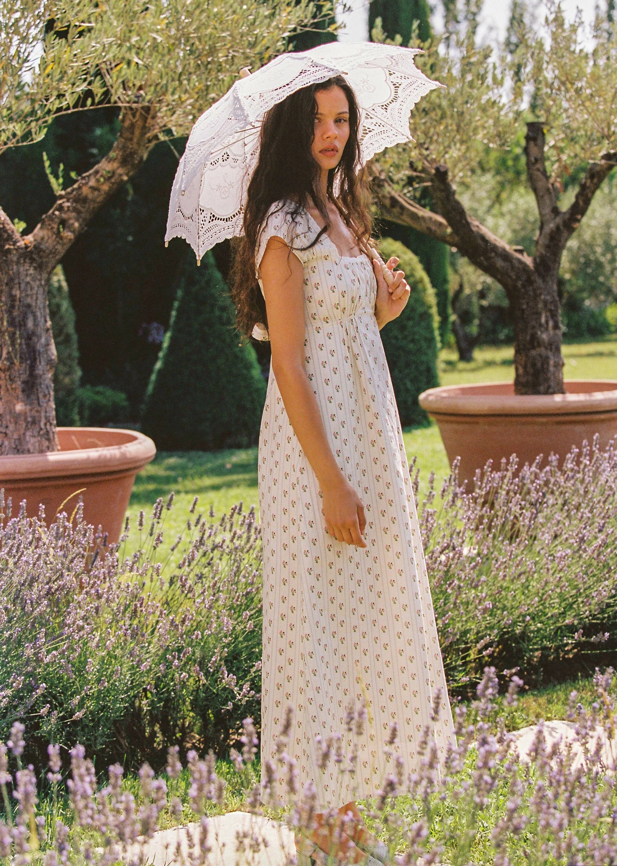 Lady wearing Irina Maxi Dress Poppy Stripe by Juni