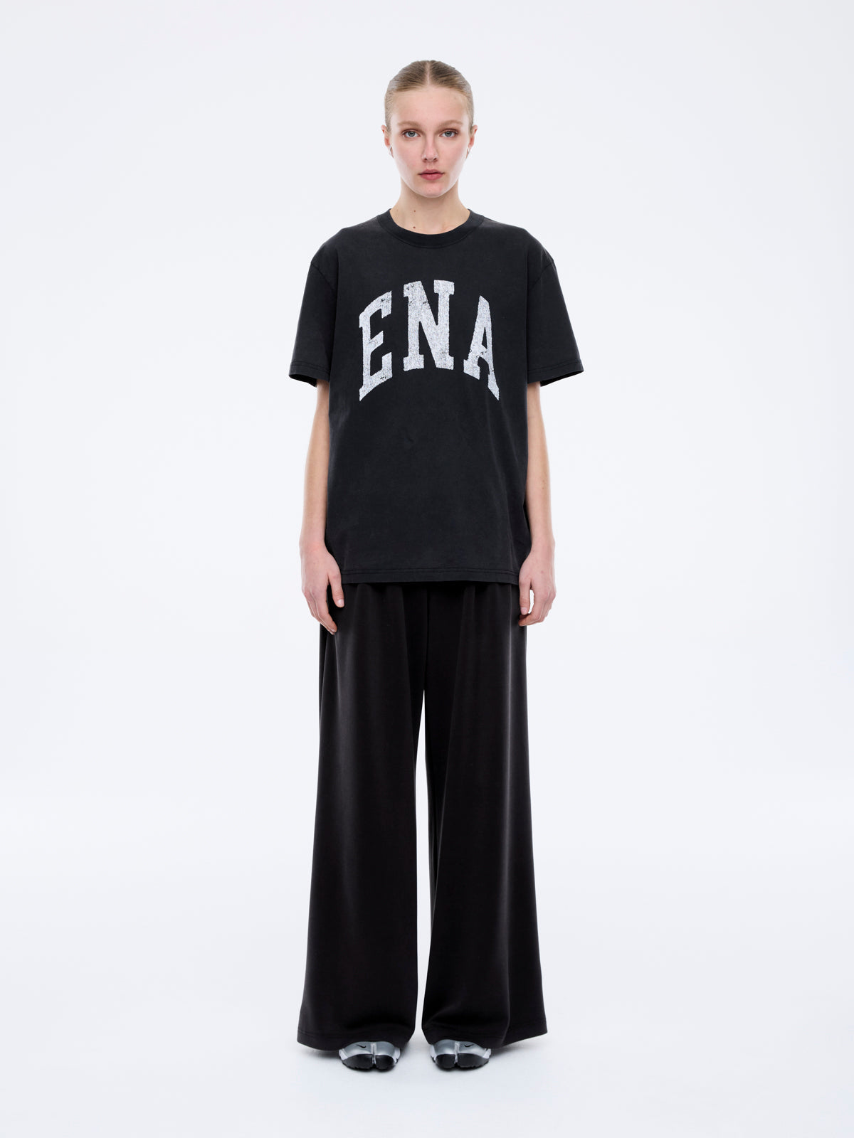 Front view of Jessie oversized collegiate tee in charcoal with white ENA lettering and relaxed fit