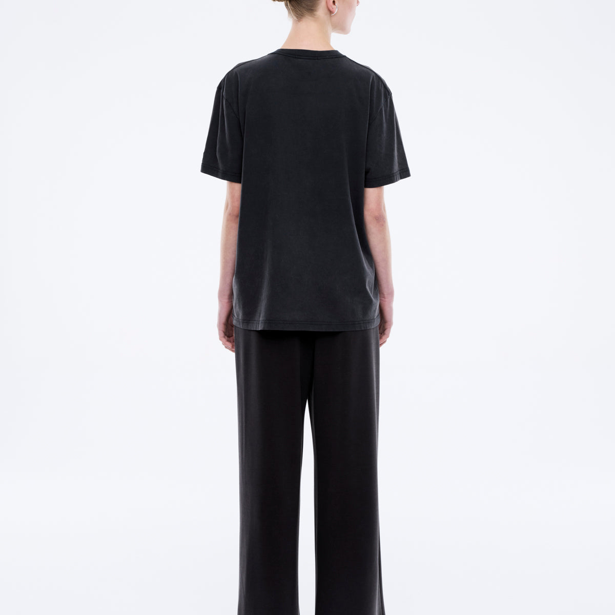 Back view of Jessie oversized tee in charcoal showing plain back design and loose silhouette