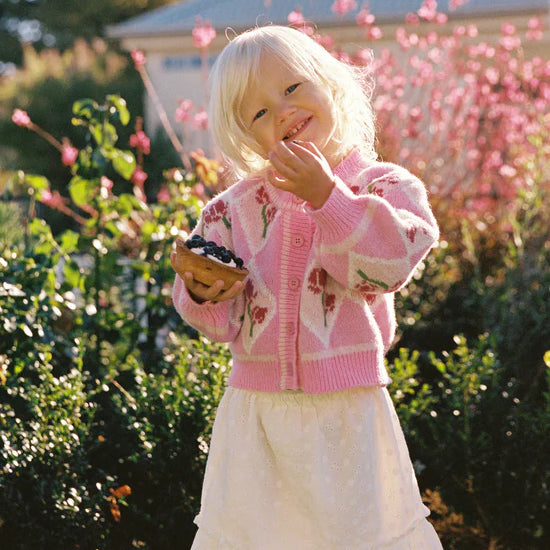 girl wearing pink floral JNR Rosie Knit Cardigan JUNI