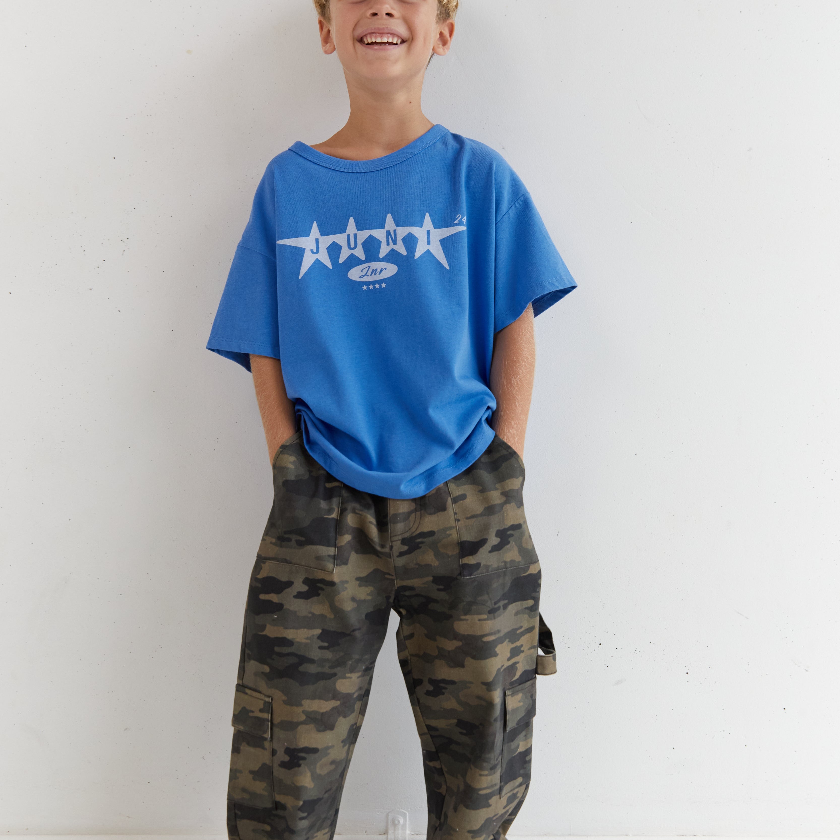 Front view of azure blue Star Tee with white star design and crew neck