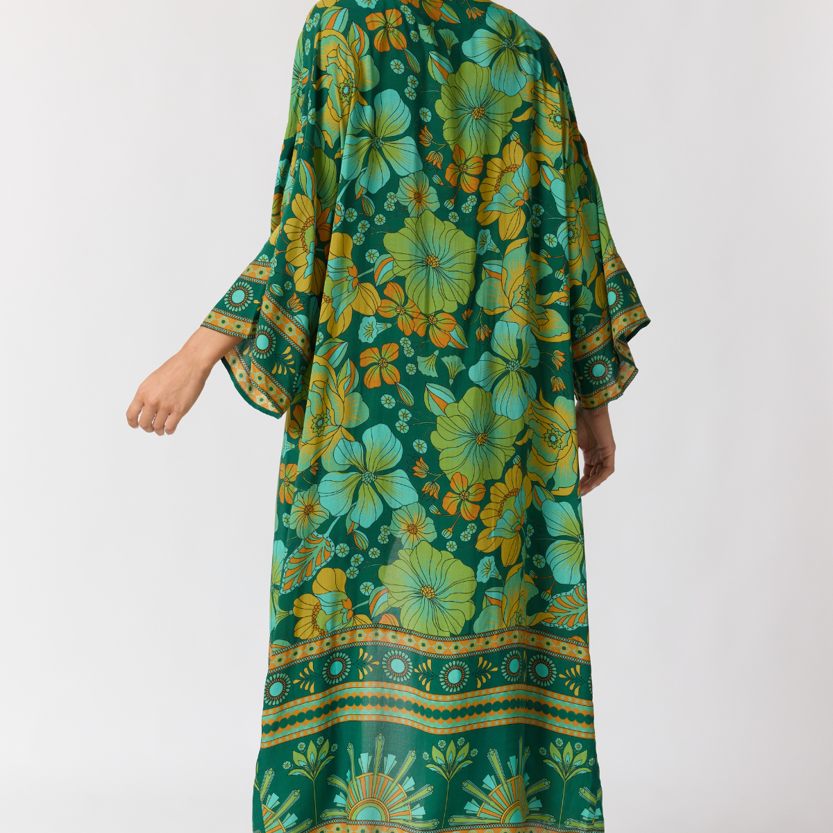 Jade robe fabric texture detail showing lightweight drape and emerald pattern