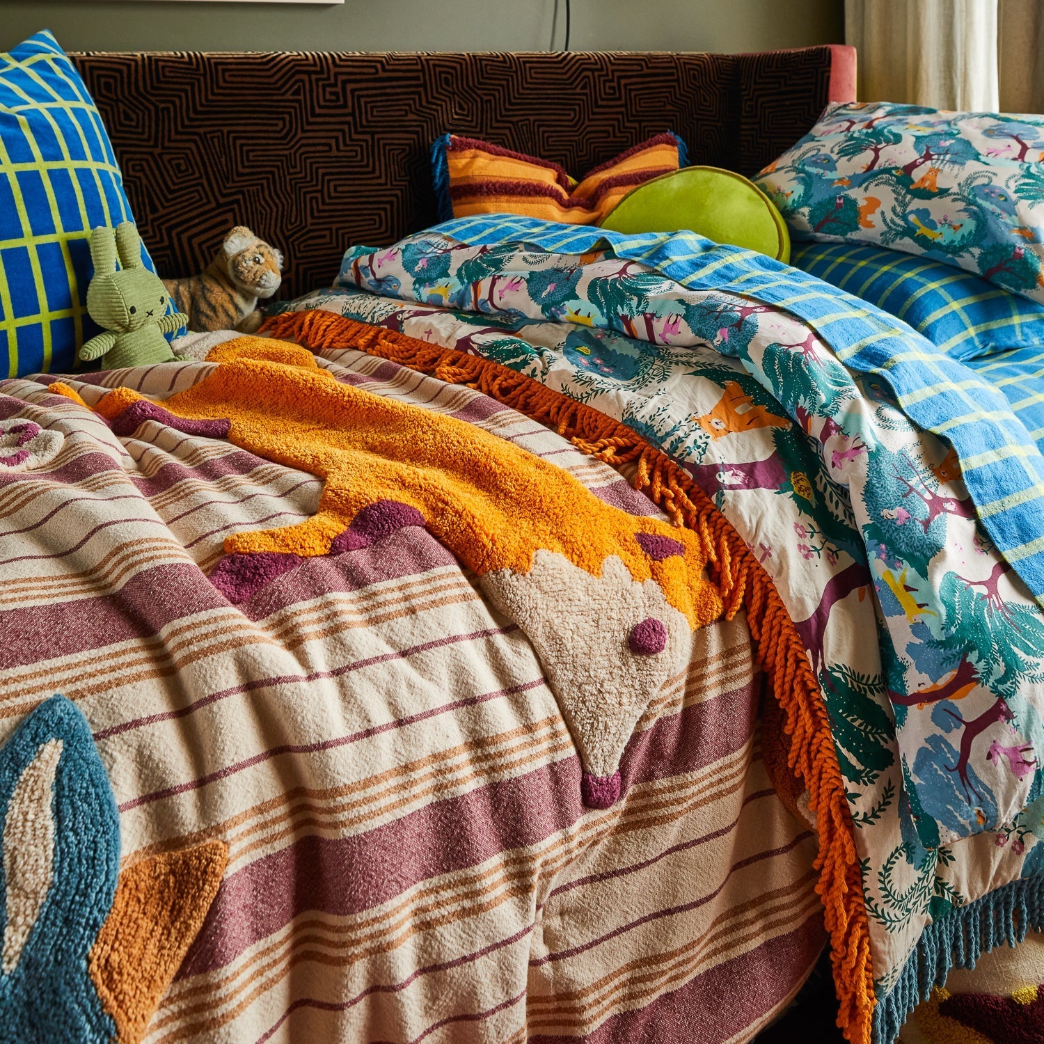 Jarvis Tufted Bedcover draped over single bed frame showing full coverage